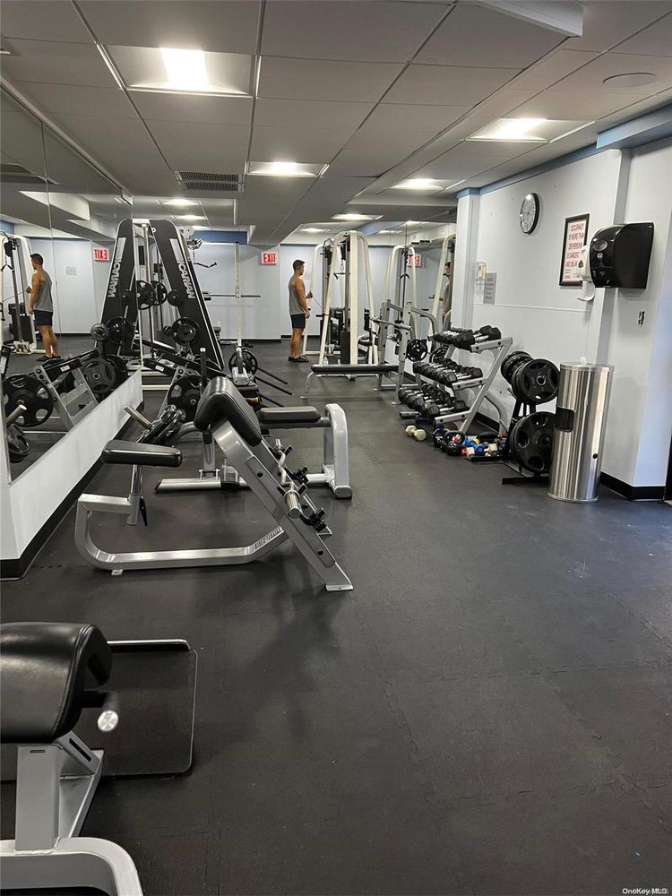2 Bay Club Drive, Unit 8V Queens, NY 11360 - Photo 14 of 17 a view of a room with gym equipment