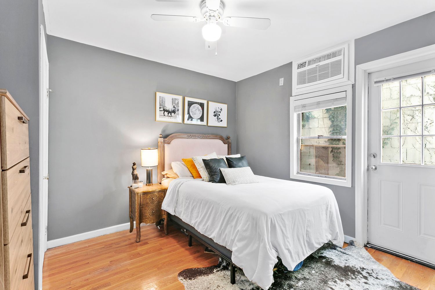 59 Stagg Street, Unit A Brooklyn, NY 11206 - Photo 3 of 4 a bedroom with a bed and a window