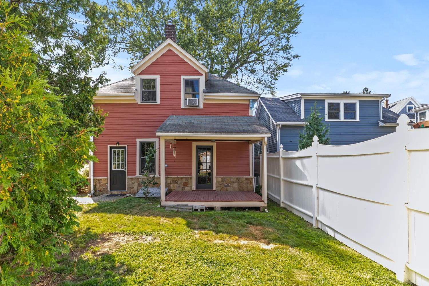 front view of a house with a yard