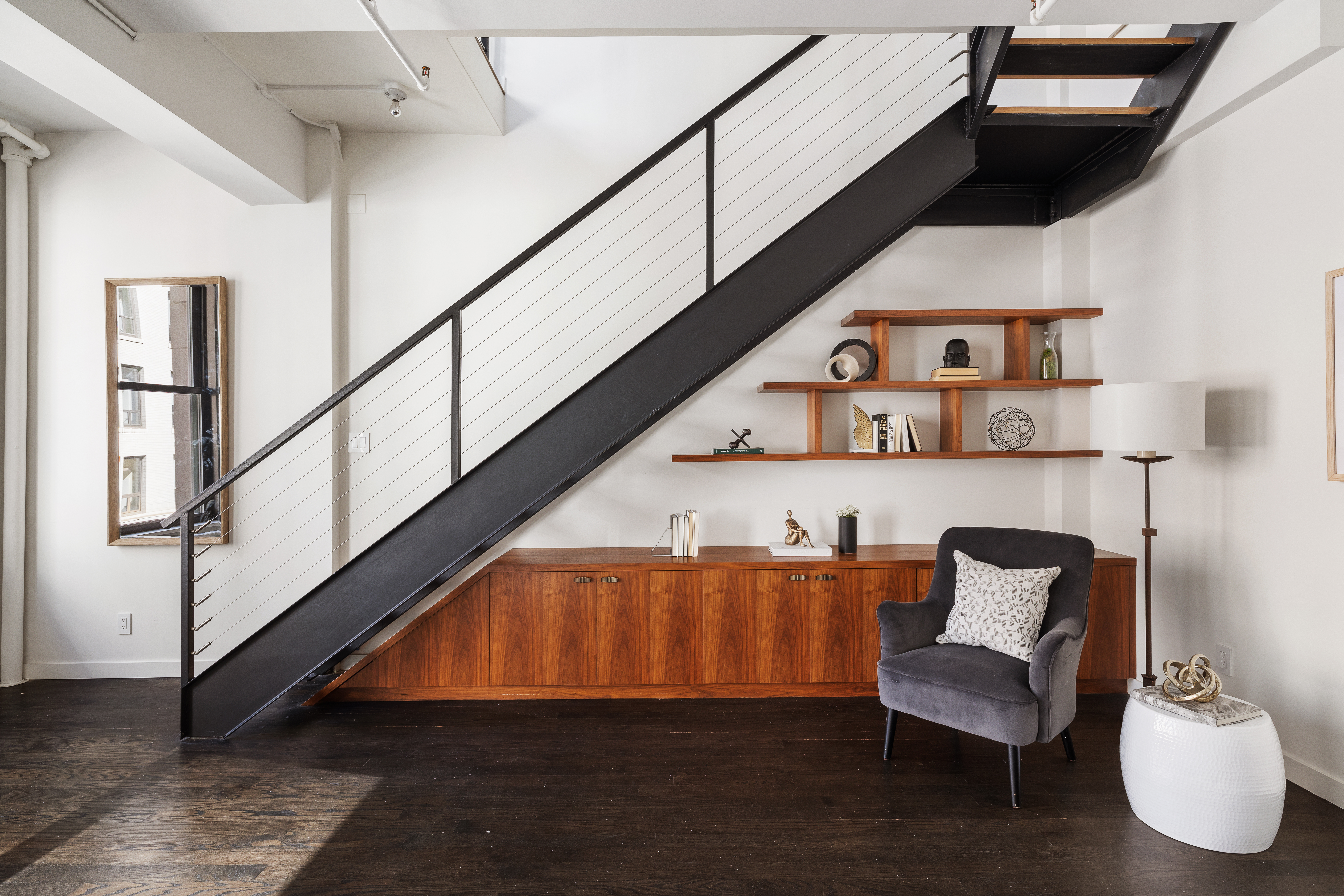 24 West 30th Street, Unit 6 Manhattan, NY 10001 - Photo 10 of 14 a room with furniture and stairs