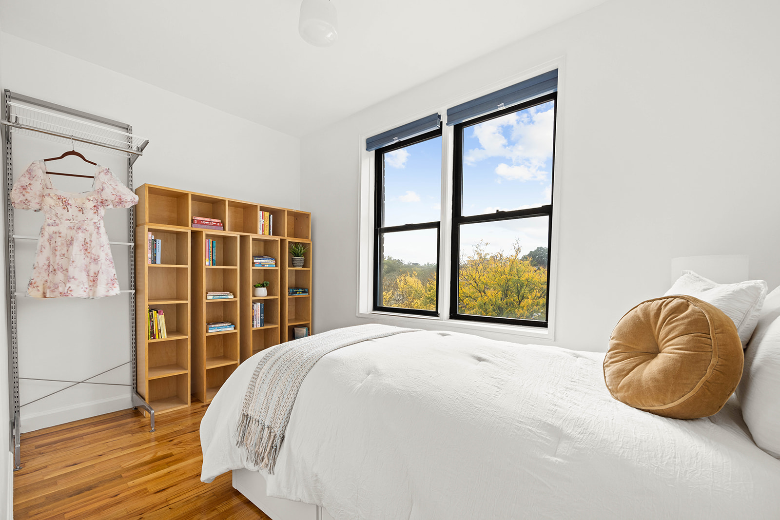 100 Ocean Parkway, Unit 3H Brooklyn, NY 11218 - Photo 6 of 11 a bedroom with a bed and a large window