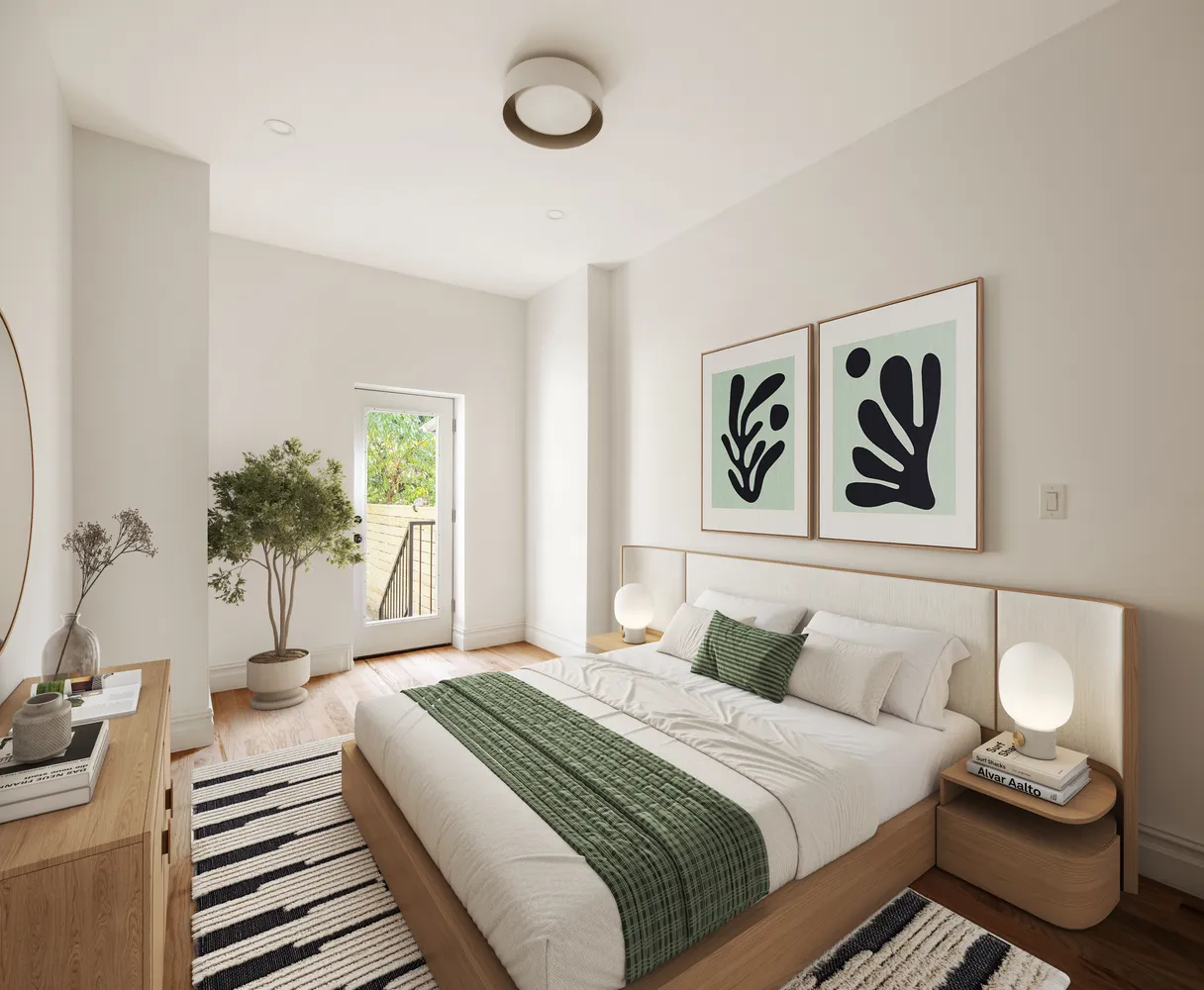 a bedroom with a bed and a couch