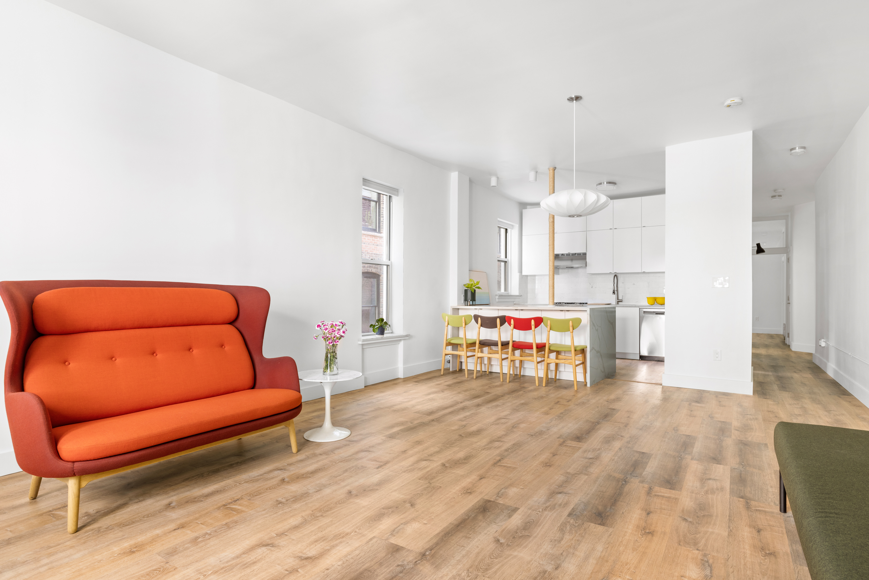 345 West 70th Street, Unit 5F Manhattan, NY 10023 - Photo 2 of 13 a living room with furniture and a couch