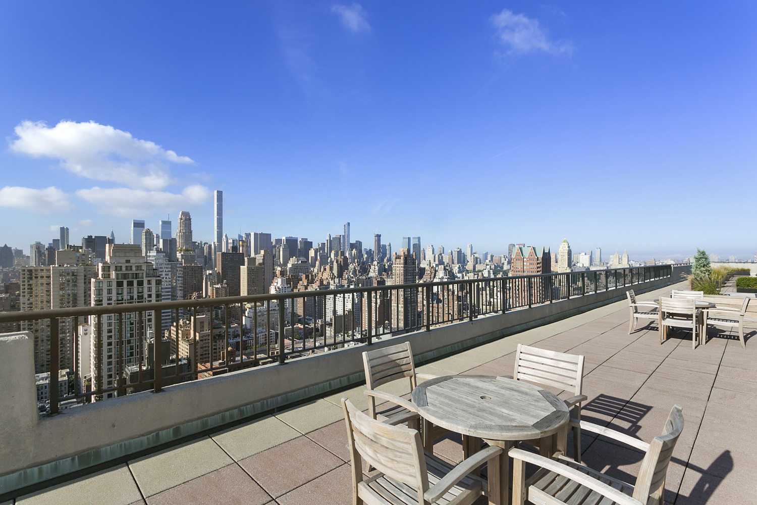 301 East 79th Street, Unit 18C Manhattan, NY 10075 - Photo 9 of 13 a view of a terrace with skyline