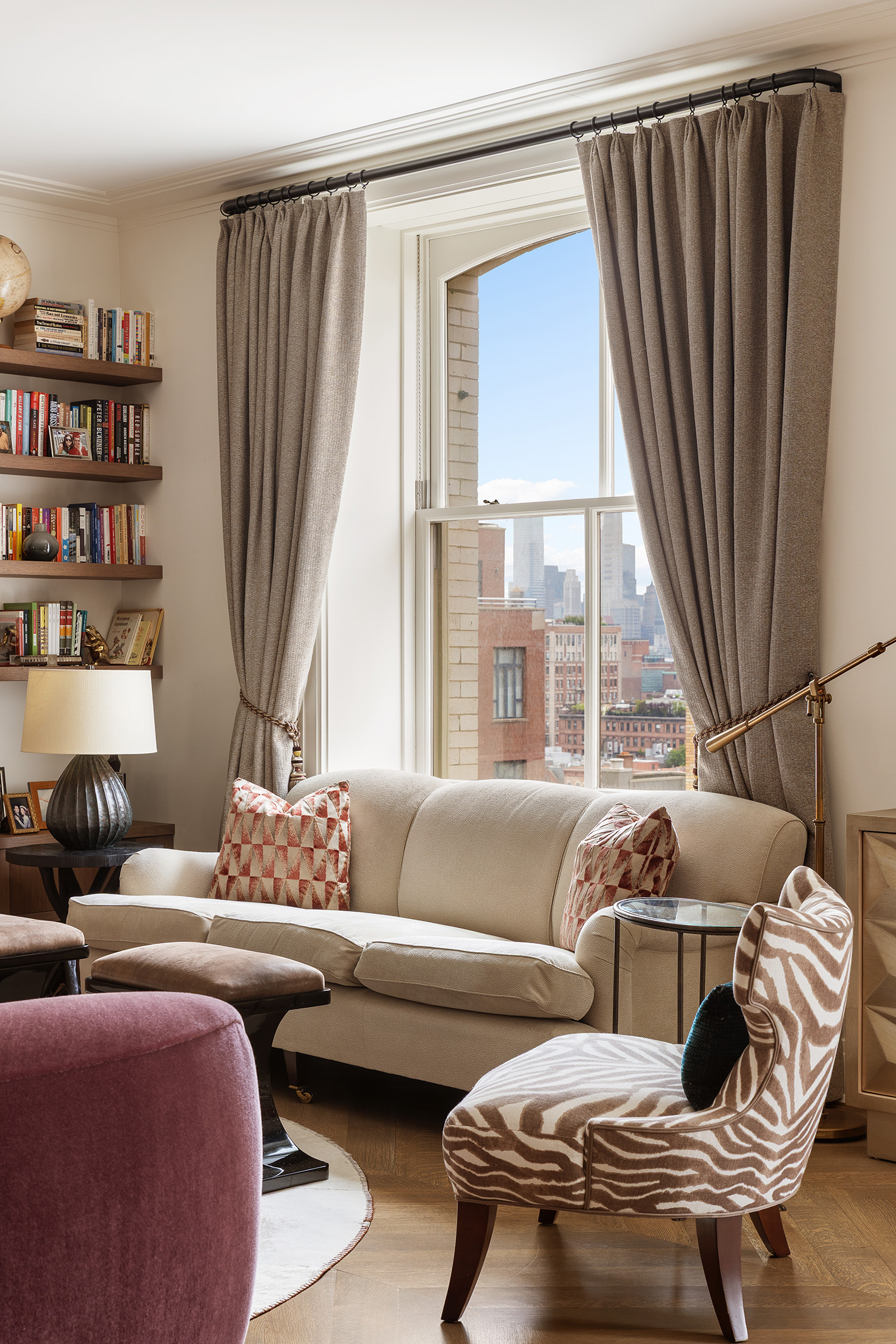 225 West 86th Street, Unit 1005 Manhattan, NY 10024 - Photo 2 of 15 a living room with furniture and a large window