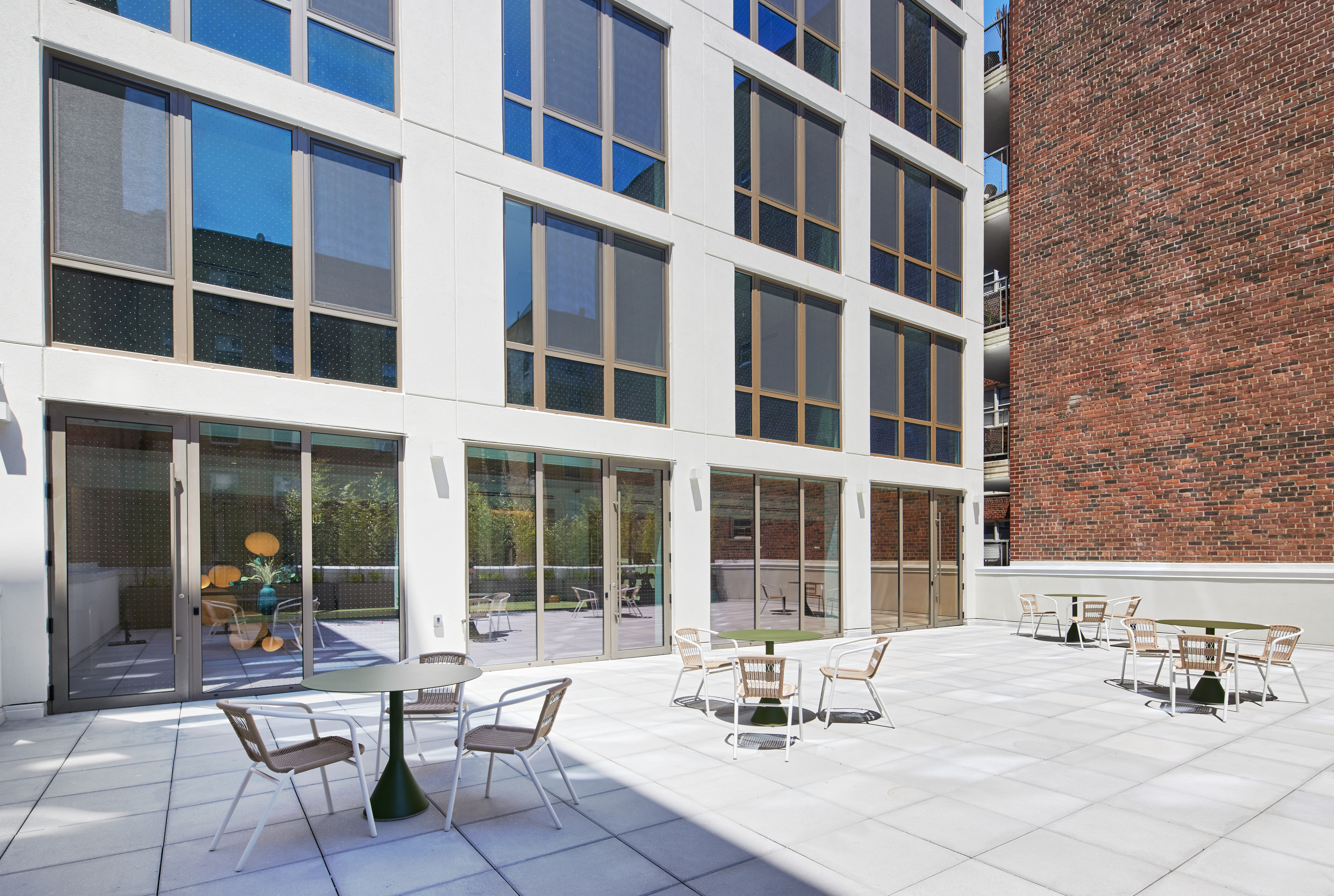 340 Lenox Road, Unit PHB Brooklyn, NY 11226 - Photo 16 of 26 a view of a building with sitting area