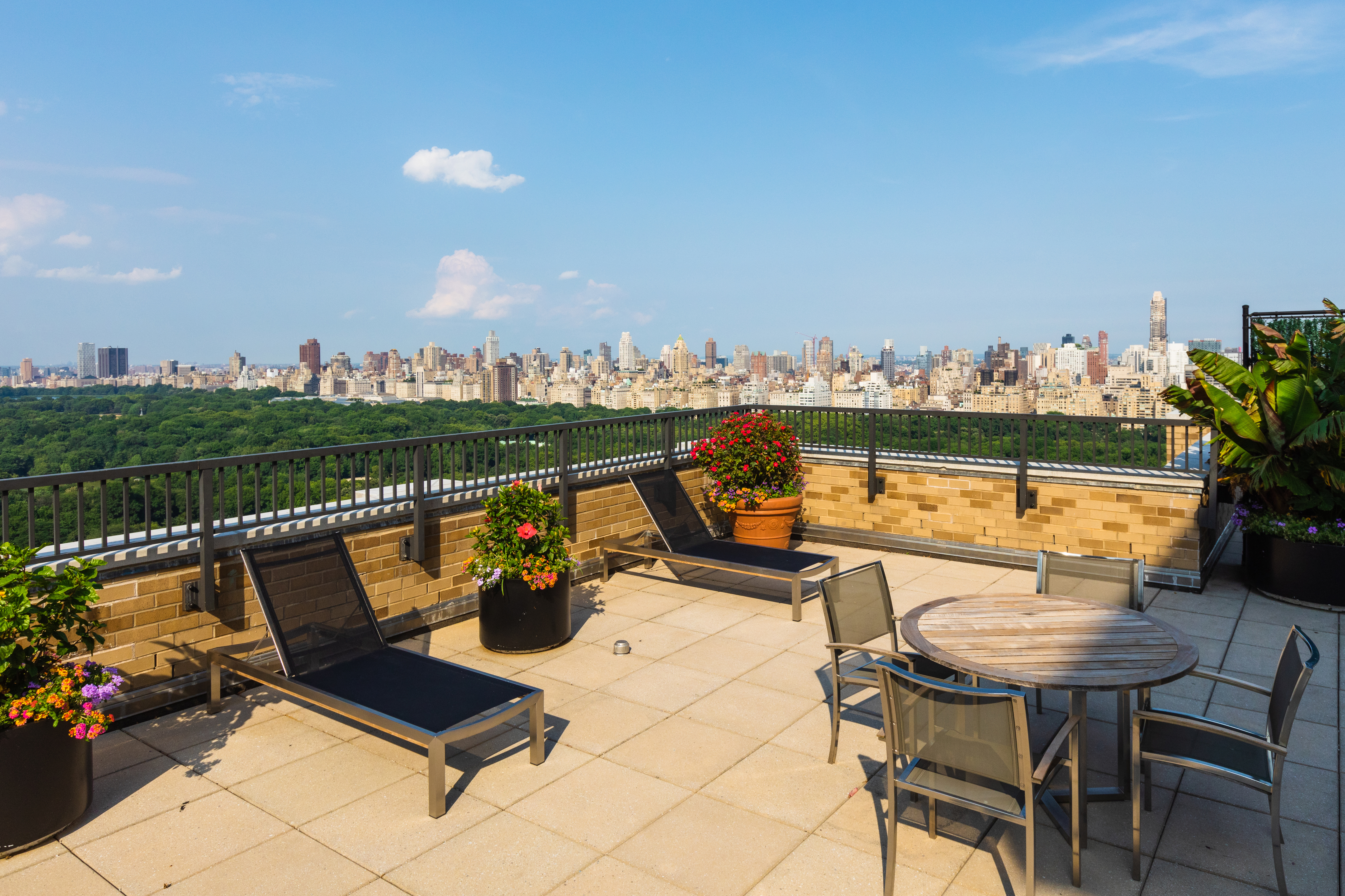 10 West 66th Street, Unit 29E Manhattan, NY 10023 - Photo 27 of 39 an outdoor sitting area with furniture and lake view