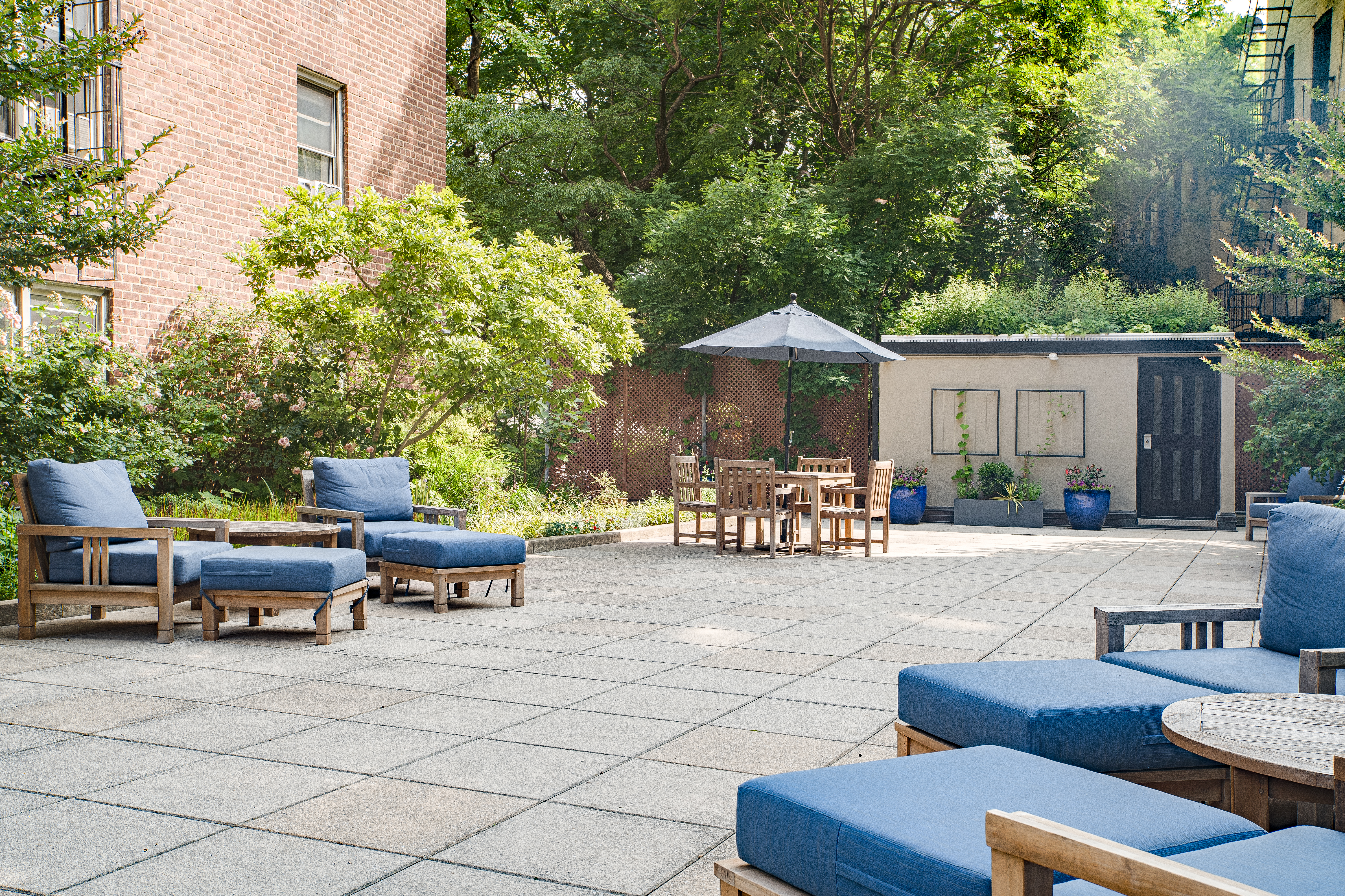 340 Haven Avenue, Unit 2H Manhattan, NY 10033 - Photo 17 of 24 a outdoor space with patio couches and a potted plant