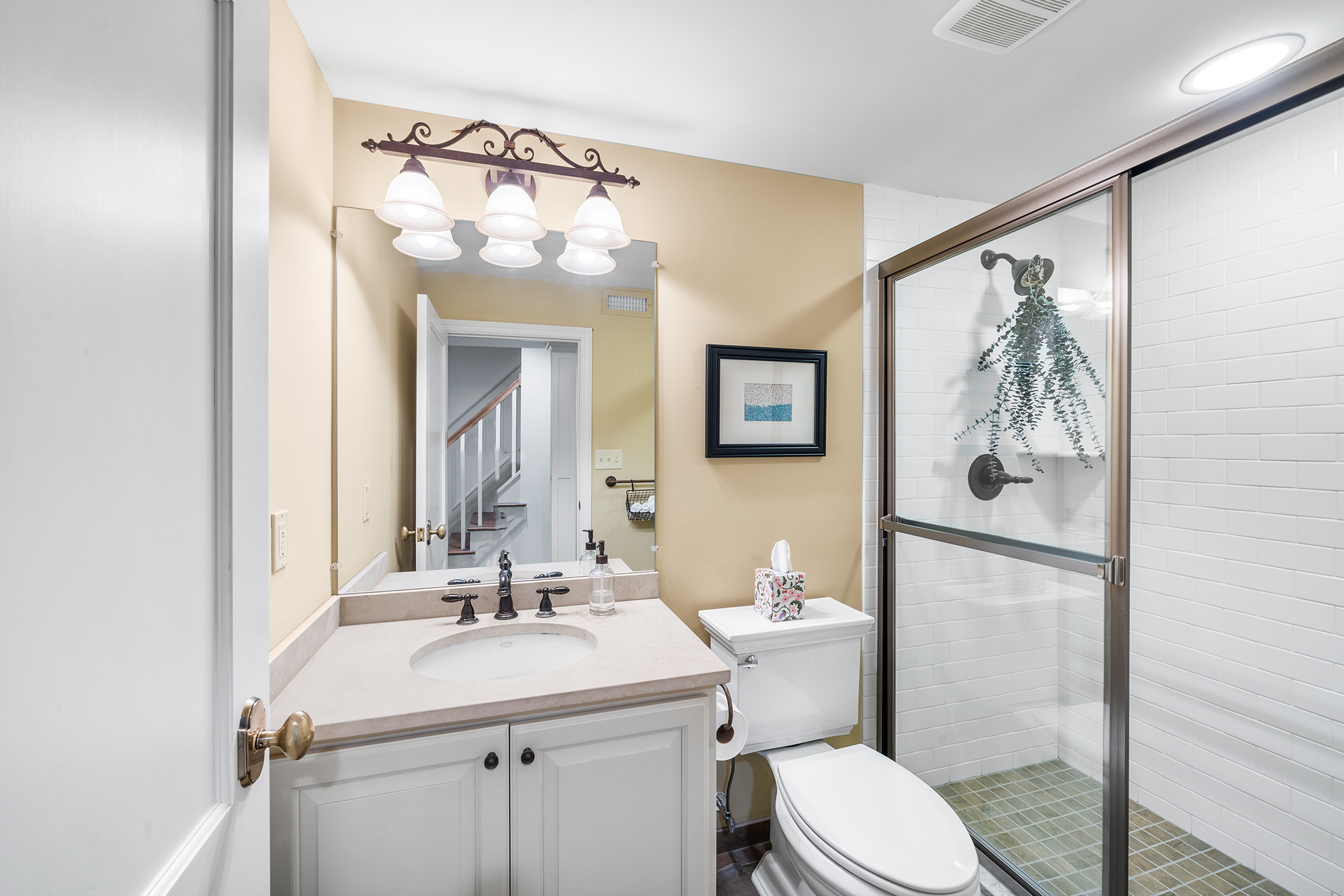 718 Arlington Road Narberth, PA 19072 - Photo 33 of 47 a bathroom with a toilet a sink and mirror