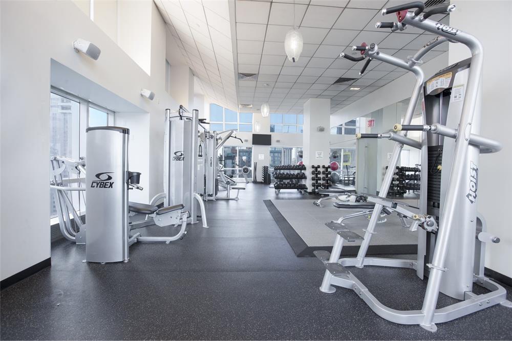 350 West 42nd Street, Unit 33G Manhattan, NY 10036 - Photo 16 of 20 a view of a room with gym equipment