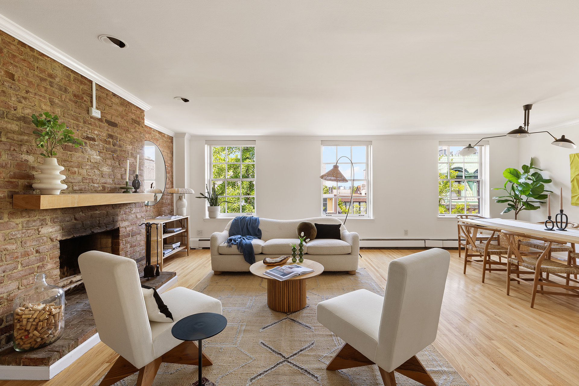 283 Hicks Street, Unit 4B Brooklyn, NY 11201 - Photo 4 of 15 a living room with fireplace furniture and a large window
