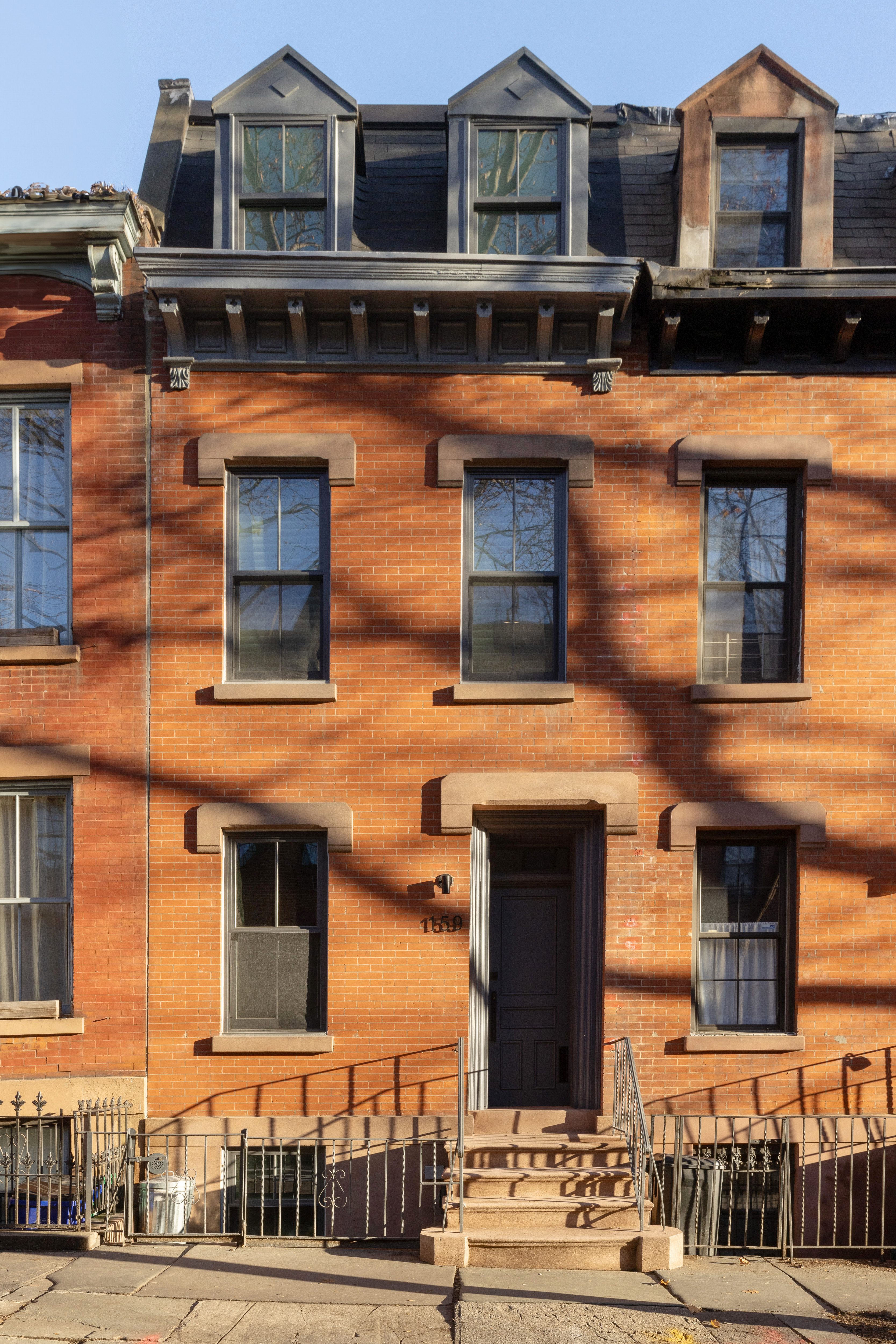 159 Hoyt Street Brooklyn, NY 11217 - Photo 17 of 18 a front view of a building with street