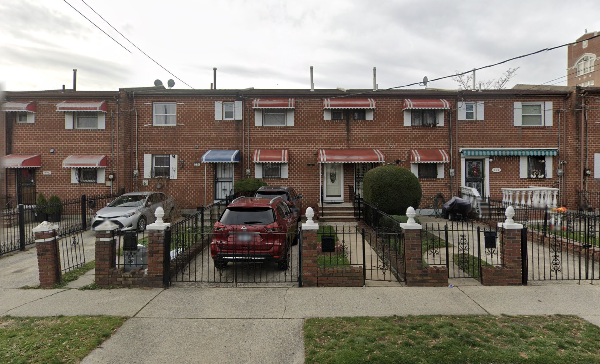 a view of a building with sitting area