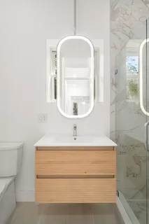 a kitchen with a stove and a washer dryer
