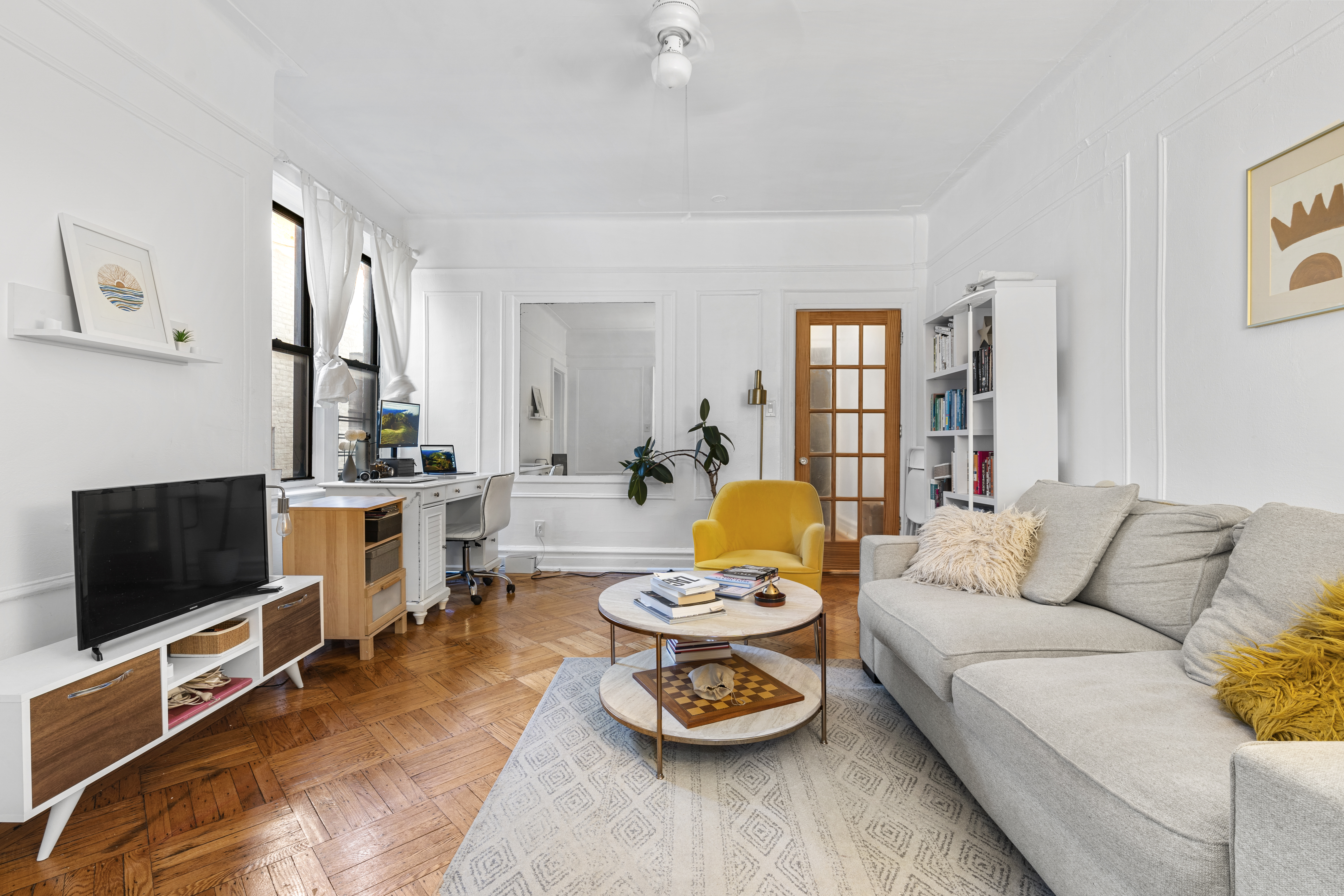 42 St Nicholas Avenue Brooklyn, NY 11237 - Photo 3 of 8 a living room with furniture and a flat screen tv