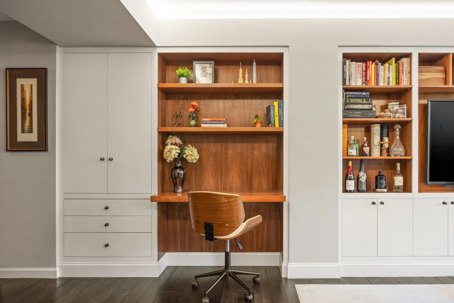 a view of an entryway with wooden floor