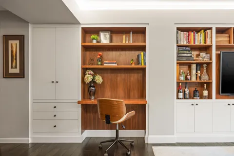 a view of an entryway with wooden floor