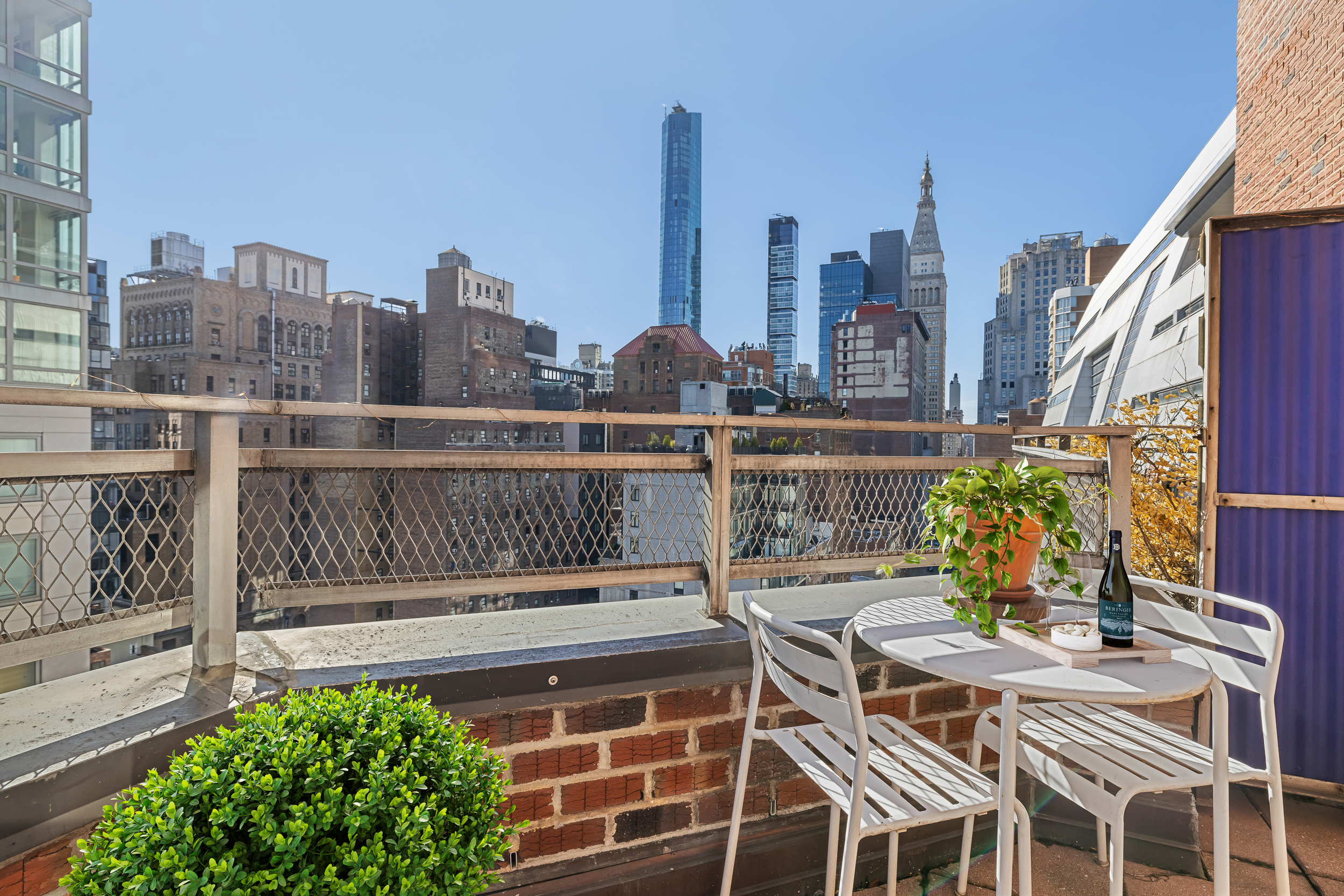 330 3rd Avenue, Unit 18F Manhattan, NY 10010 - Photo 4 of 10 a view of balcony with outdoor seating and city view