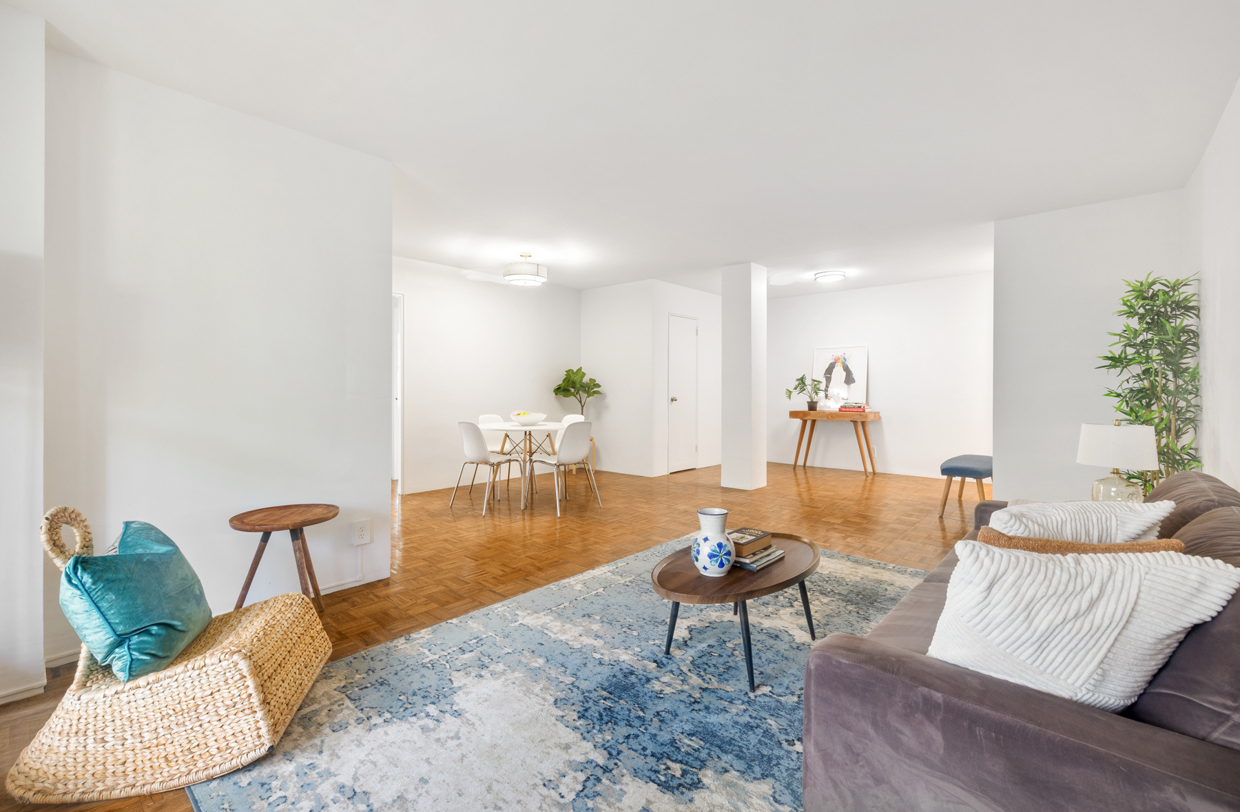 35-51 85th Street, Unit 4K Queens, NY 11372 - Photo 4 of 11 a living room with furniture and a wooden floor