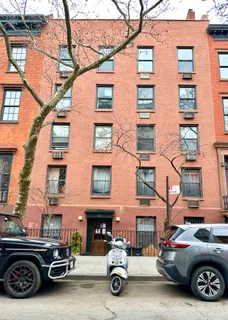 a car parked in front of a building