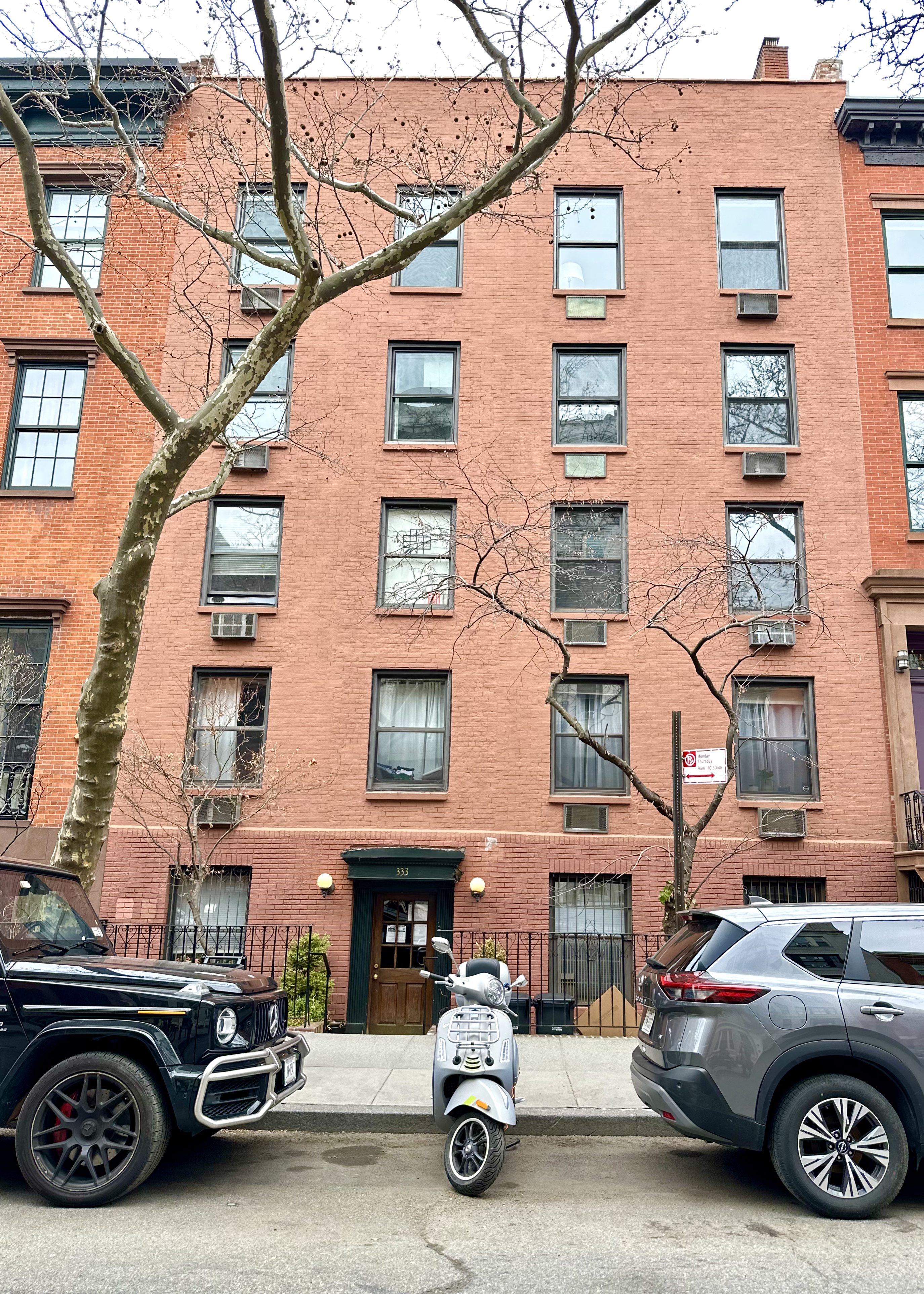333 West 22nd Street, Unit 5A Manhattan, NY 10011 - Photo 11 of 12 a car parked in front of a building