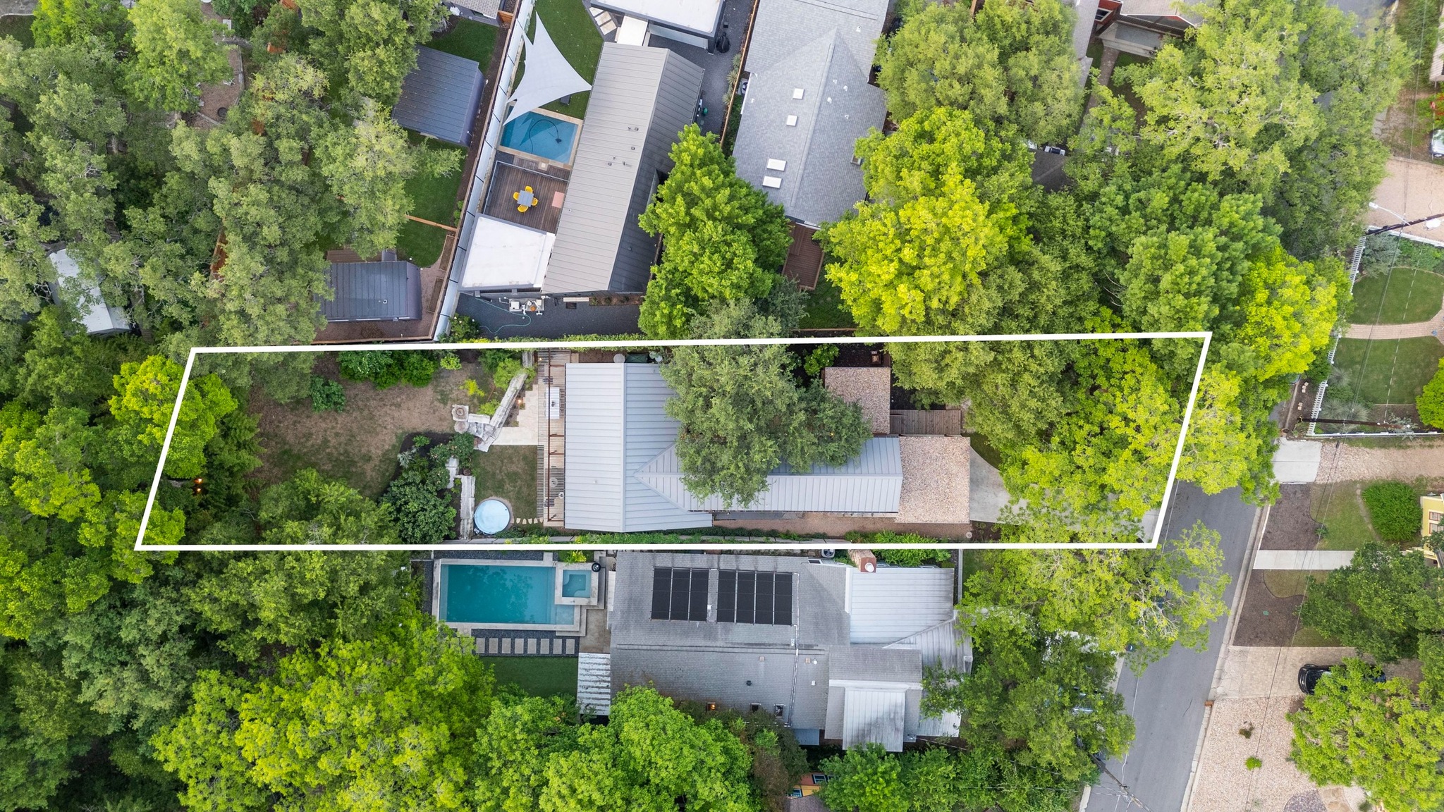 1206 Bickler Road Austin, TX 78704 - Photo 8 of 65 an aerial view of houses with a yard