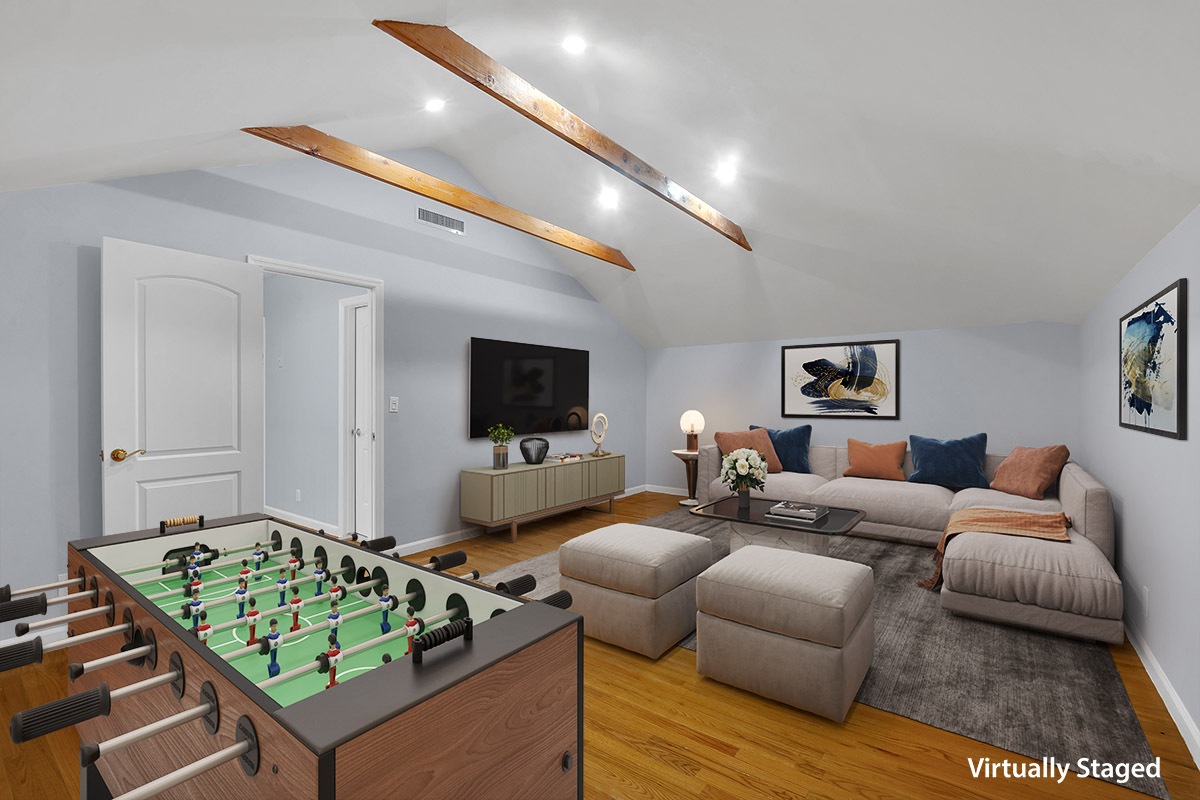 963 Kent Avenue, Unit D3 Brooklyn, NY 11205 - Photo 7 of 16 a living room with furniture and a flat screen tv