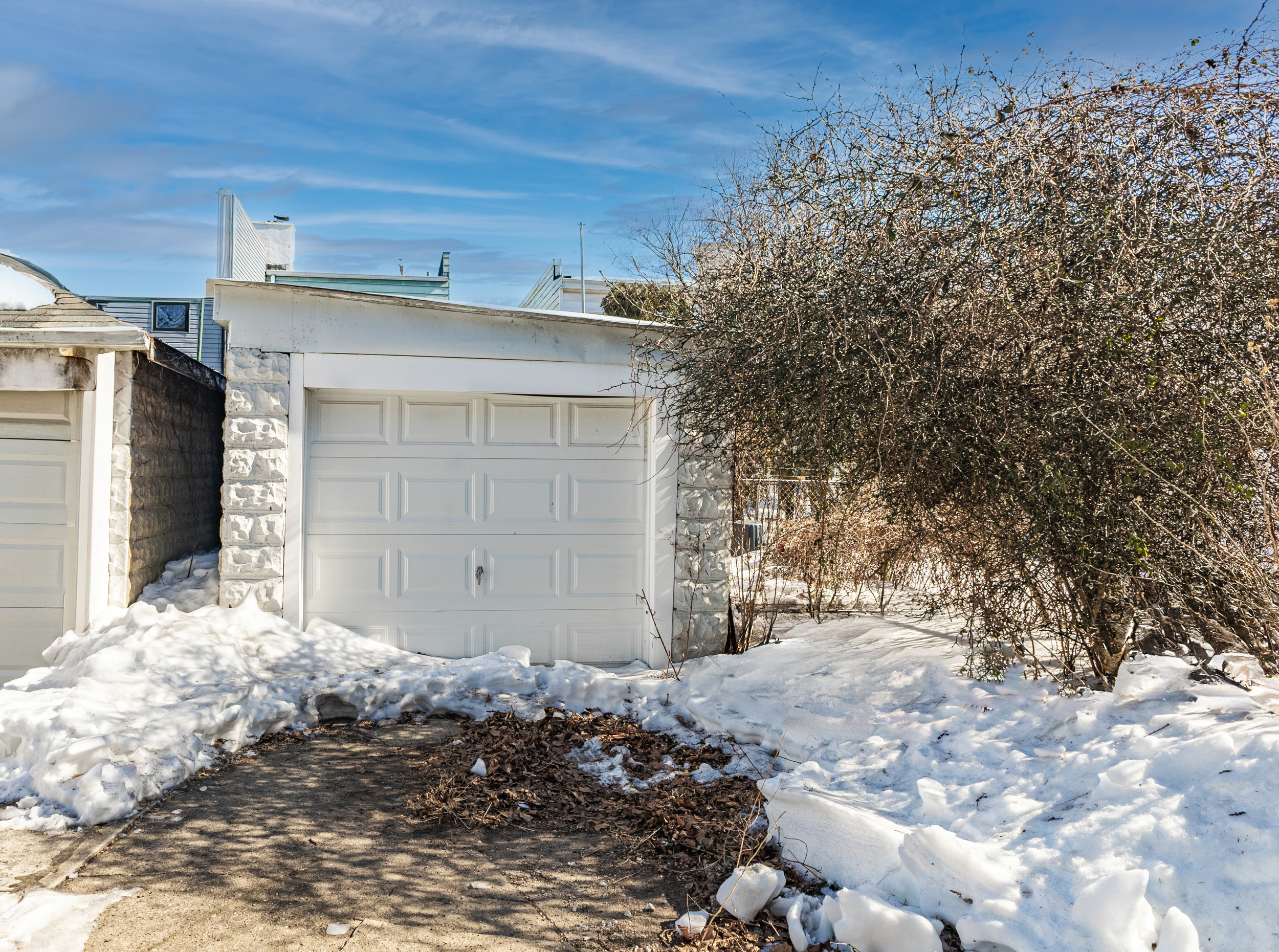 961 East 32nd Street Brooklyn, NY 11210 - Photo 18 of 24 a view of a house with a snow