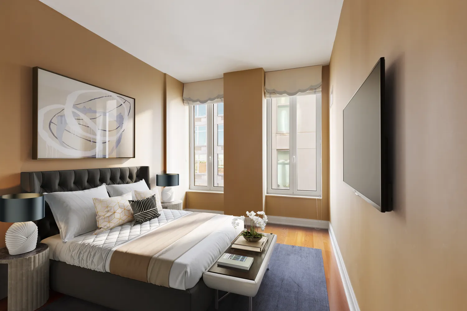 a bedroom with furniture and a large window