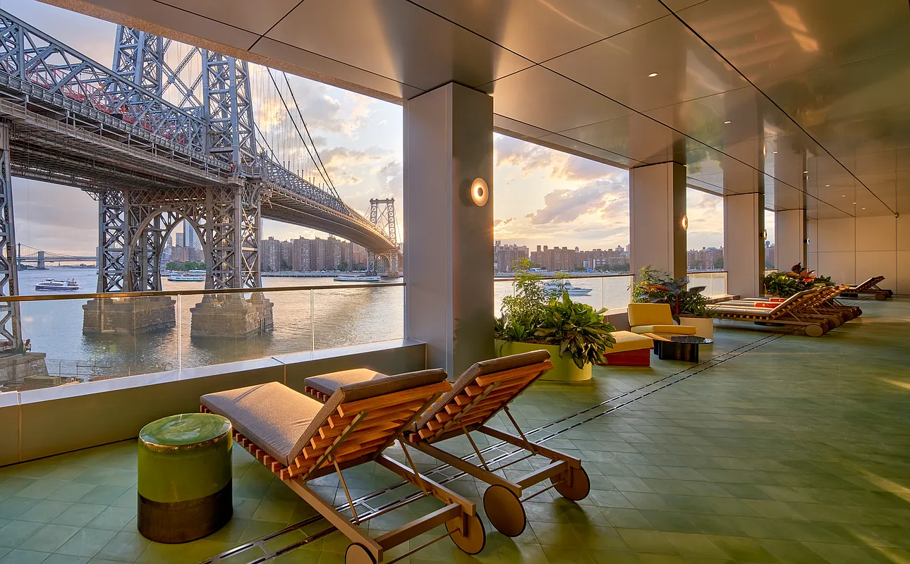 8 South 4th Street, Unit 15D Brooklyn, NY 11249 - Photo 17 of 29 a living room with patio furniture and a floor to ceiling window