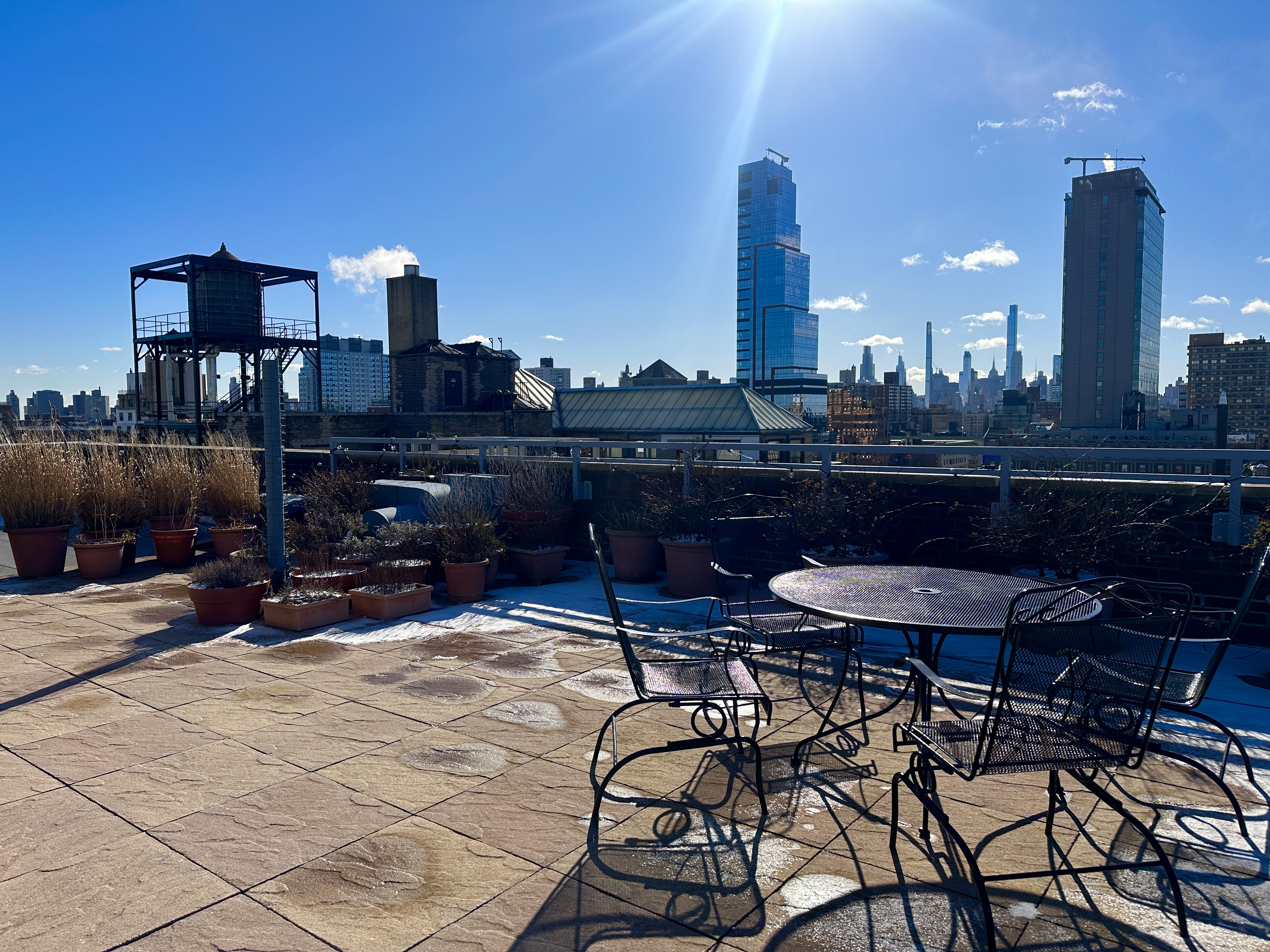 250 West 103rd Street, Unit 4A Manhattan, NY 10025 - Photo 12 of 14 a view of a terrace with furniture and a fire pit