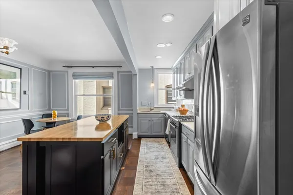 a view of gallery with mirror