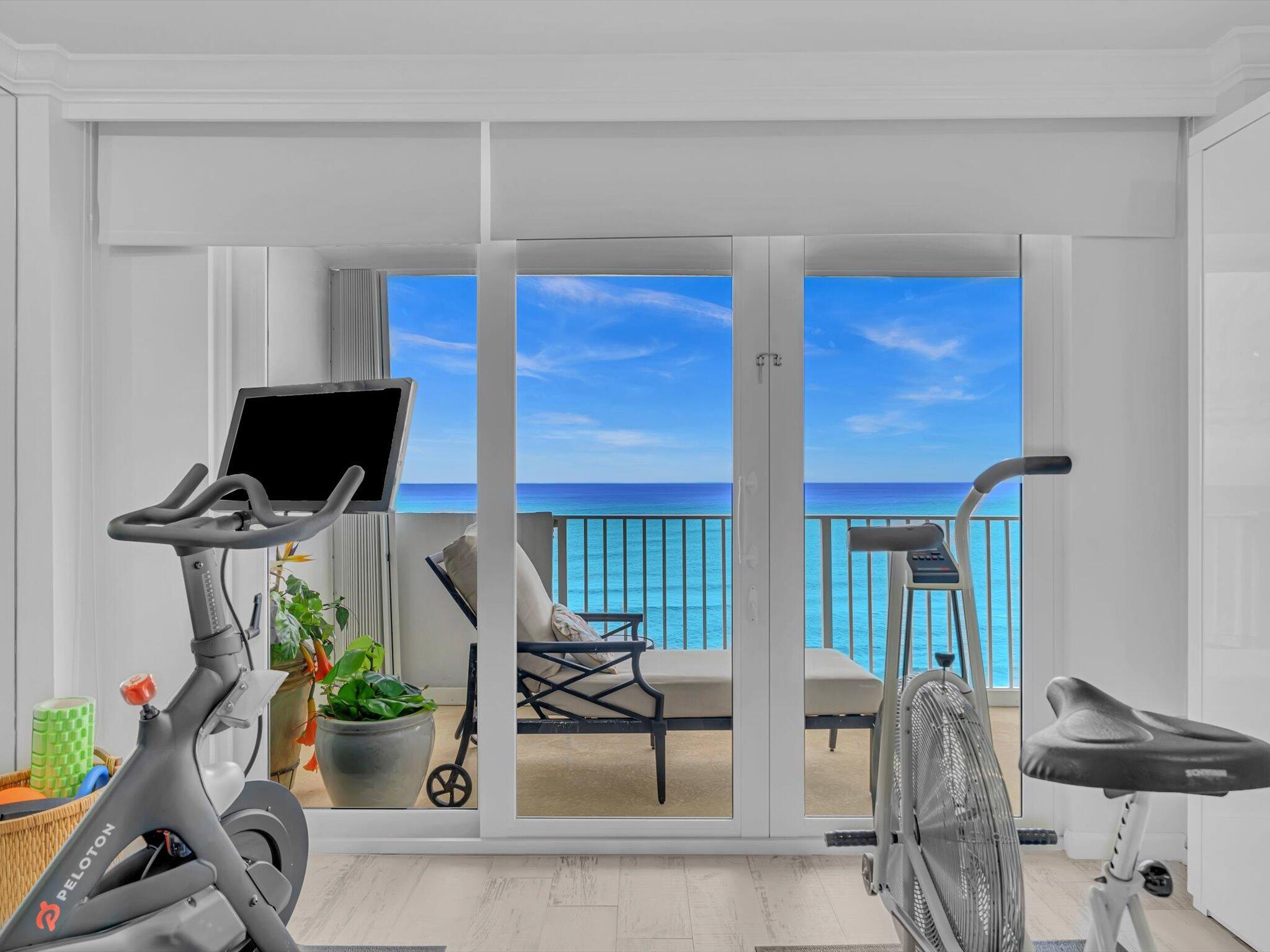 3000 South Ocean Boulevard, Unit 1504 Boca Raton, FL 33432 - Photo 18 of 64 a living room with furniture a flat screen tv and a window