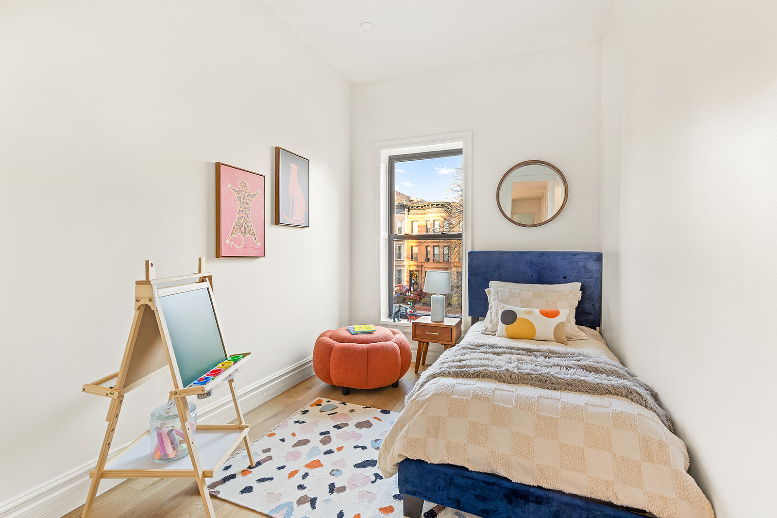 966 St Johns Place Brooklyn, NY 11213 - Photo 14 of 20 a bedroom with a bed and wooden floor