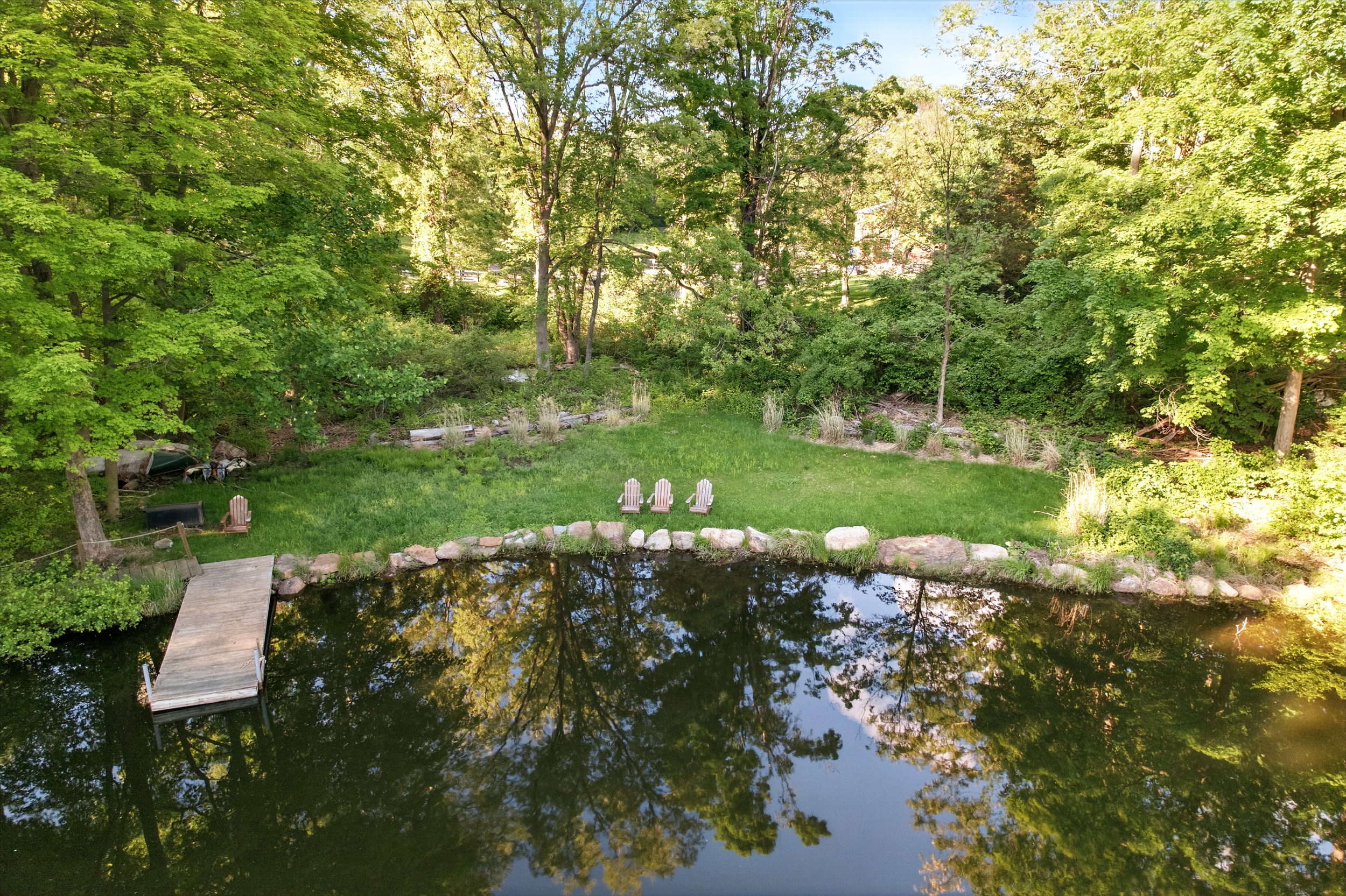 19 Pond Road Cold Spring, NY 10516 - Photo 6 of 32 a view of a golf course with a lake