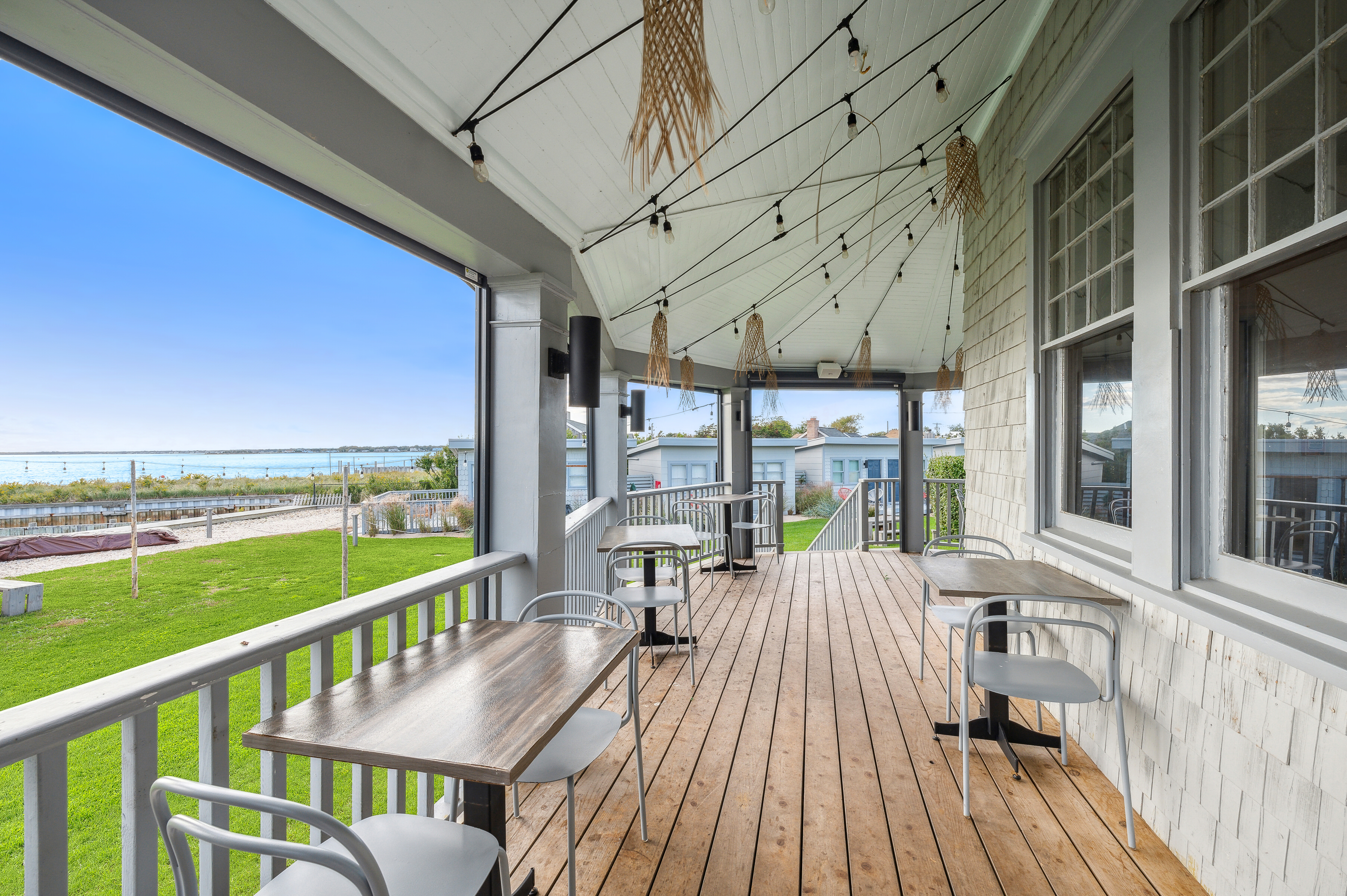 32 Lighthouse Road Hampton Bays, NY 11946 - Photo 27 of 51 a view of a balcony with lake view and a ocean view