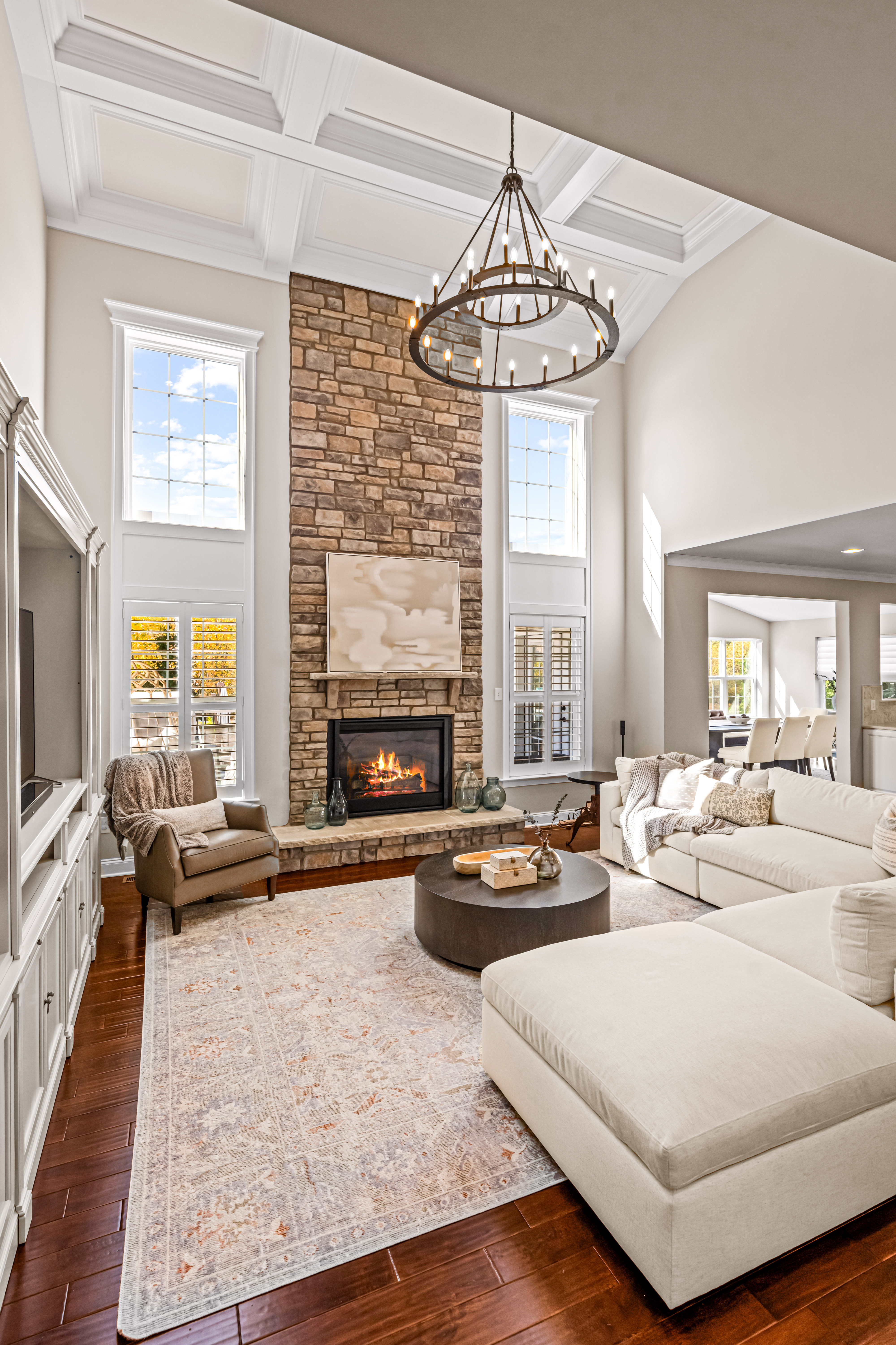 52 Wellesley Way Marlton, NJ 08053 - Photo 36 of 98 a living room with furniture a fireplace and a chandelier