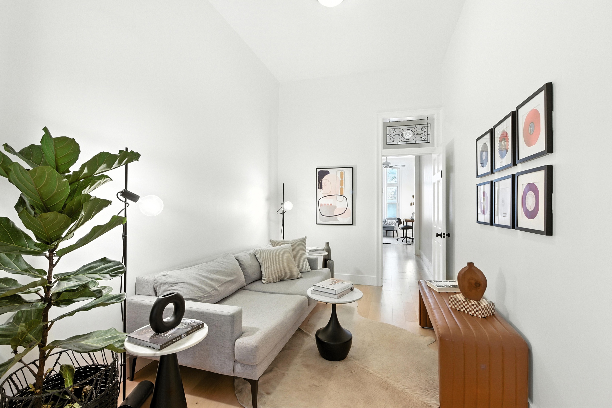 152 North 9th Street, Unit 1R Brooklyn, NY 11249 - Photo 3 of 13 a living room with furniture and a potted plant