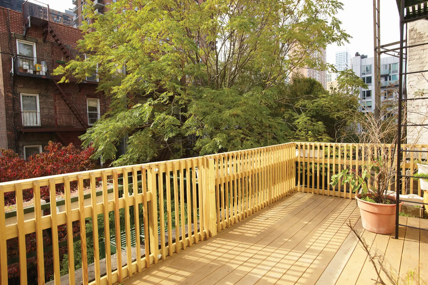 a view of a wooden street from a balcony
