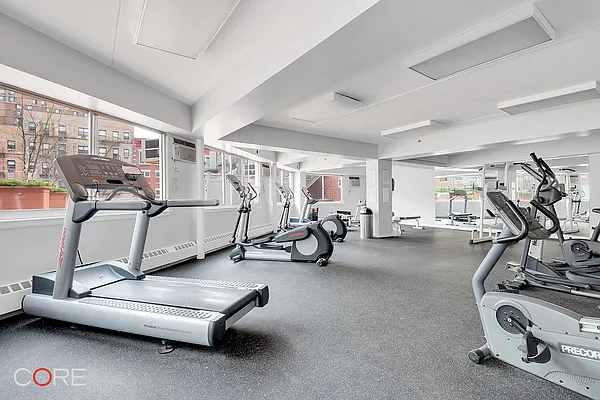 300 West 145th Street, Unit 1QQ Manhattan, NY 10039 - Photo 14 of 15 a view of a room with gym equipment