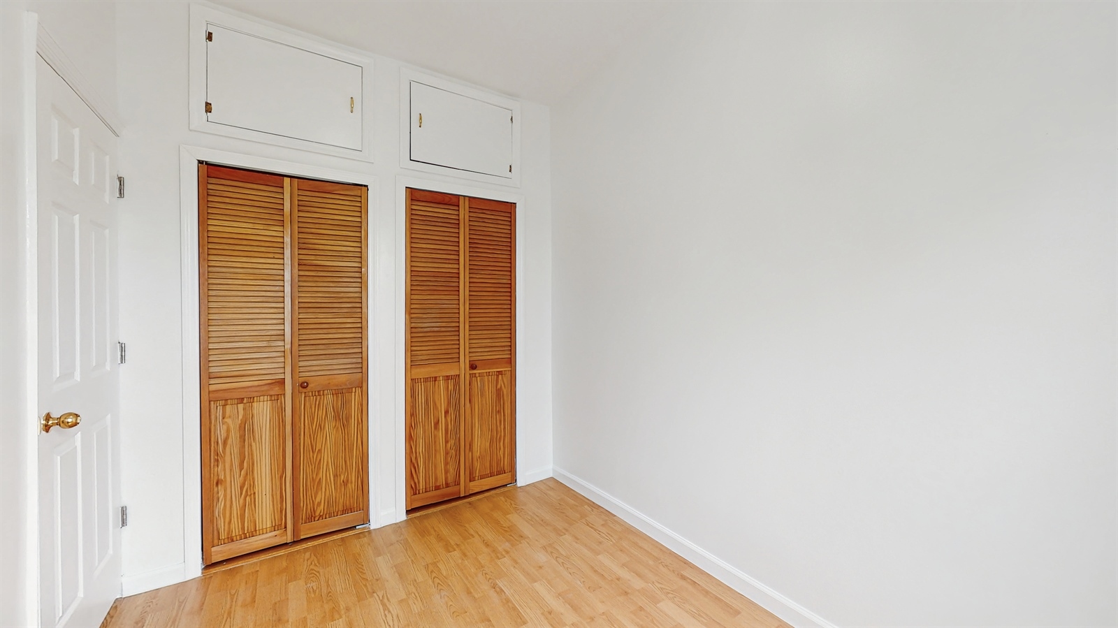 454 77th Street, Unit 3 Brooklyn, NY 11209 - Photo 18 of 25 a view of empty room with wooden floor