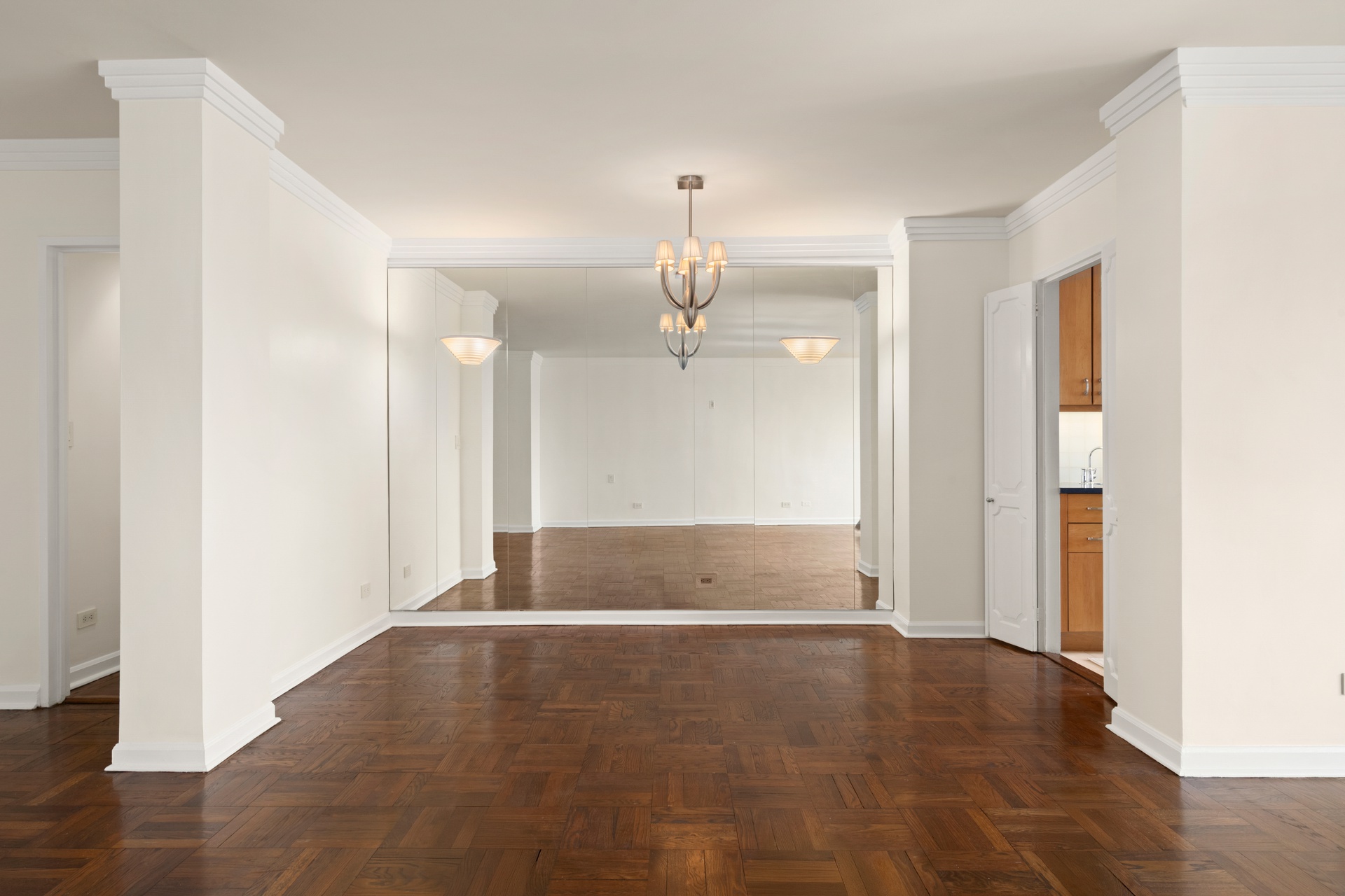 70 East 10th Street, Unit 20C Manhattan, NY 10003 - Photo 10 of 24 a view of livingroom with hardwood floor and hallway