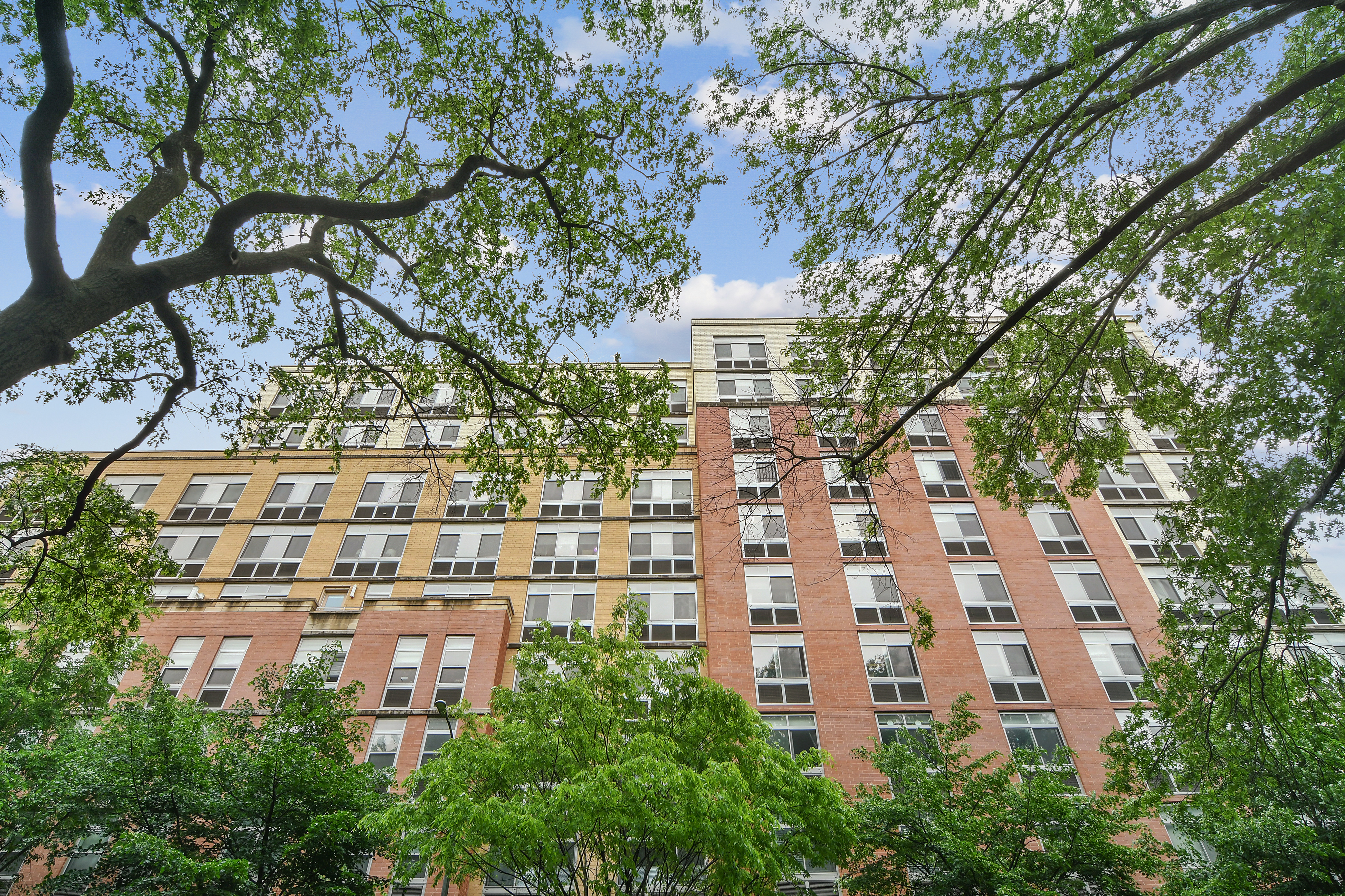 102 Bradhurst Avenue, Unit 604 Manhattan, NY 10039 - Photo 1 of 1 a view of a large building