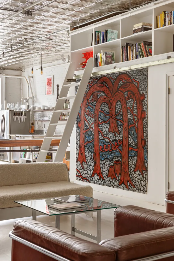 a view of staircase with a rug