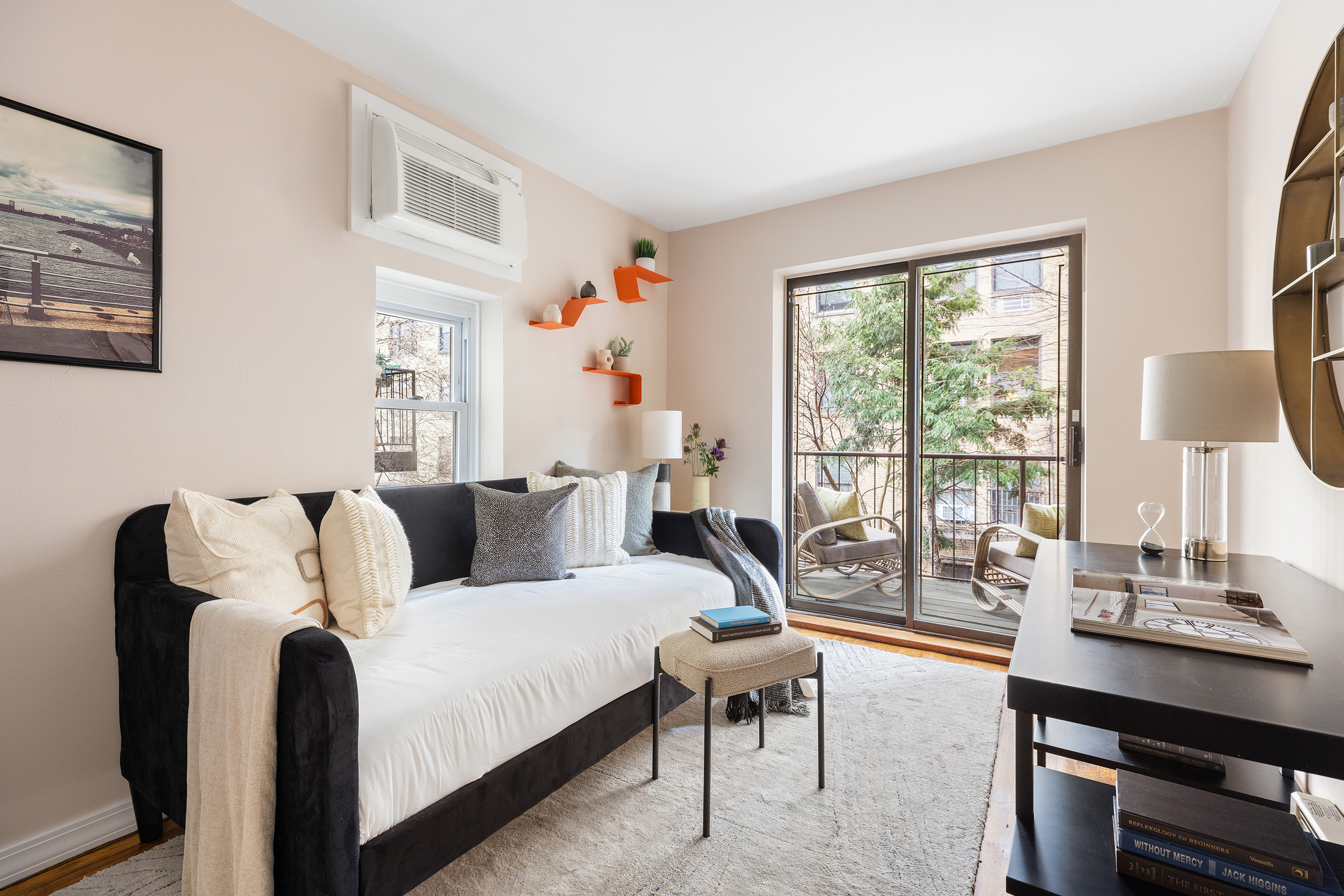 107 West 78th Street, Unit B Manhattan, NY 10024 - Photo 9 of 15 a bedroom with furniture and a large window
