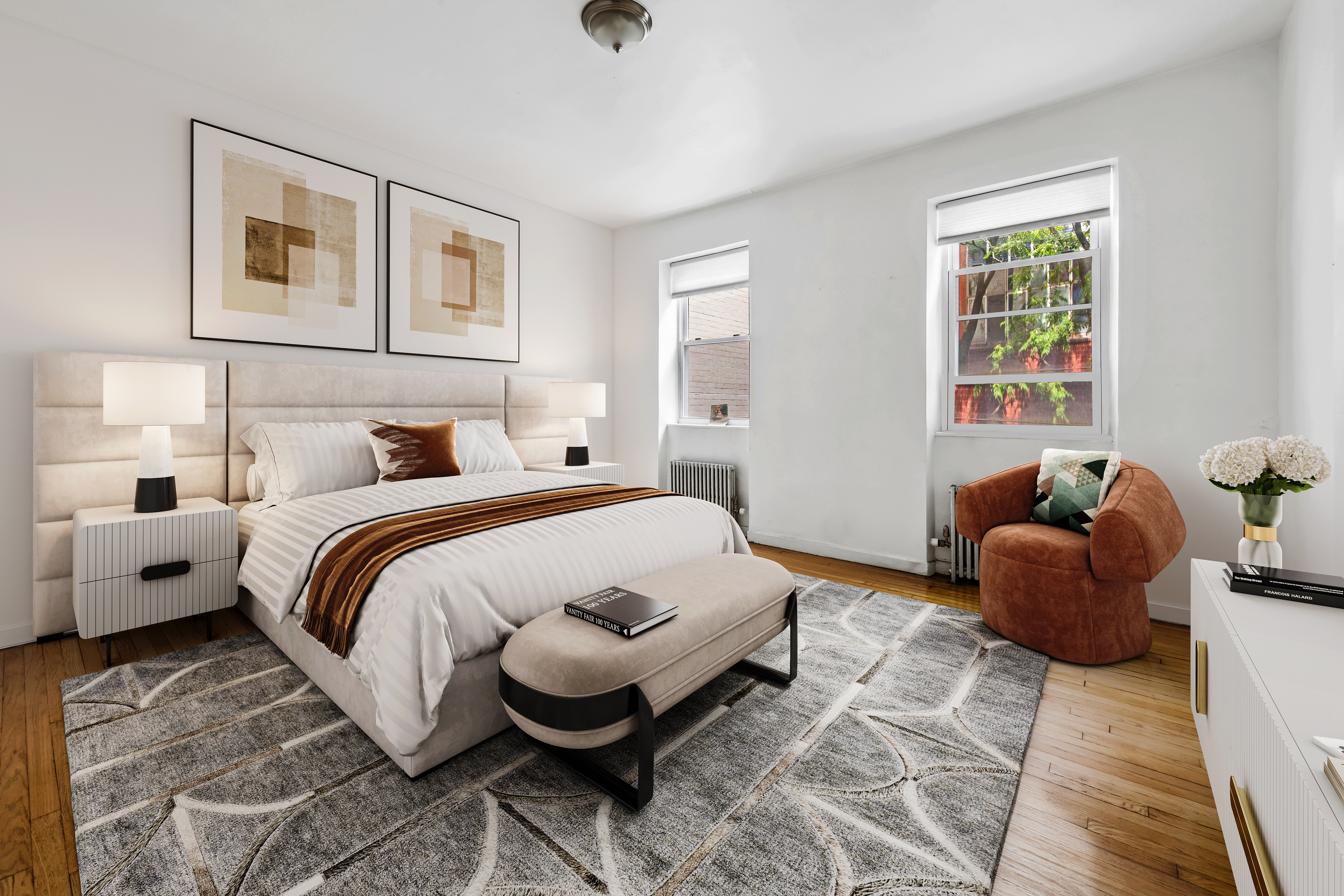 209 East 48th Street Manhattan, NY 10017 - Photo 8 of 13 a spacious bedroom with a bed and wooden floor