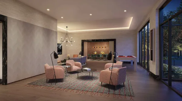 a living room with furniture and a potted plant
