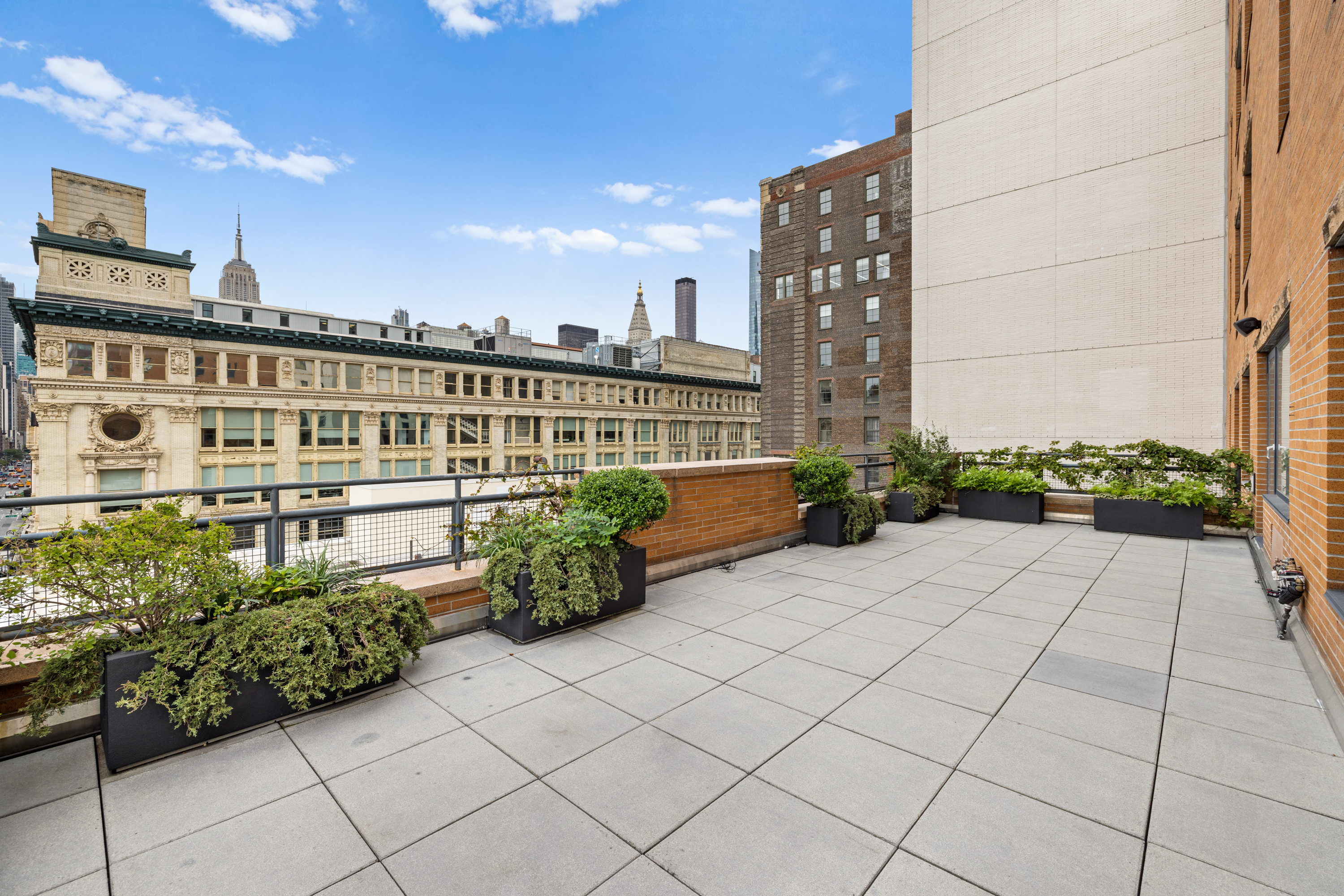 63 West 17th Street, Unit 7A Manhattan, NY 10011 - Photo 19 of 32 a view of balcony with potted plants