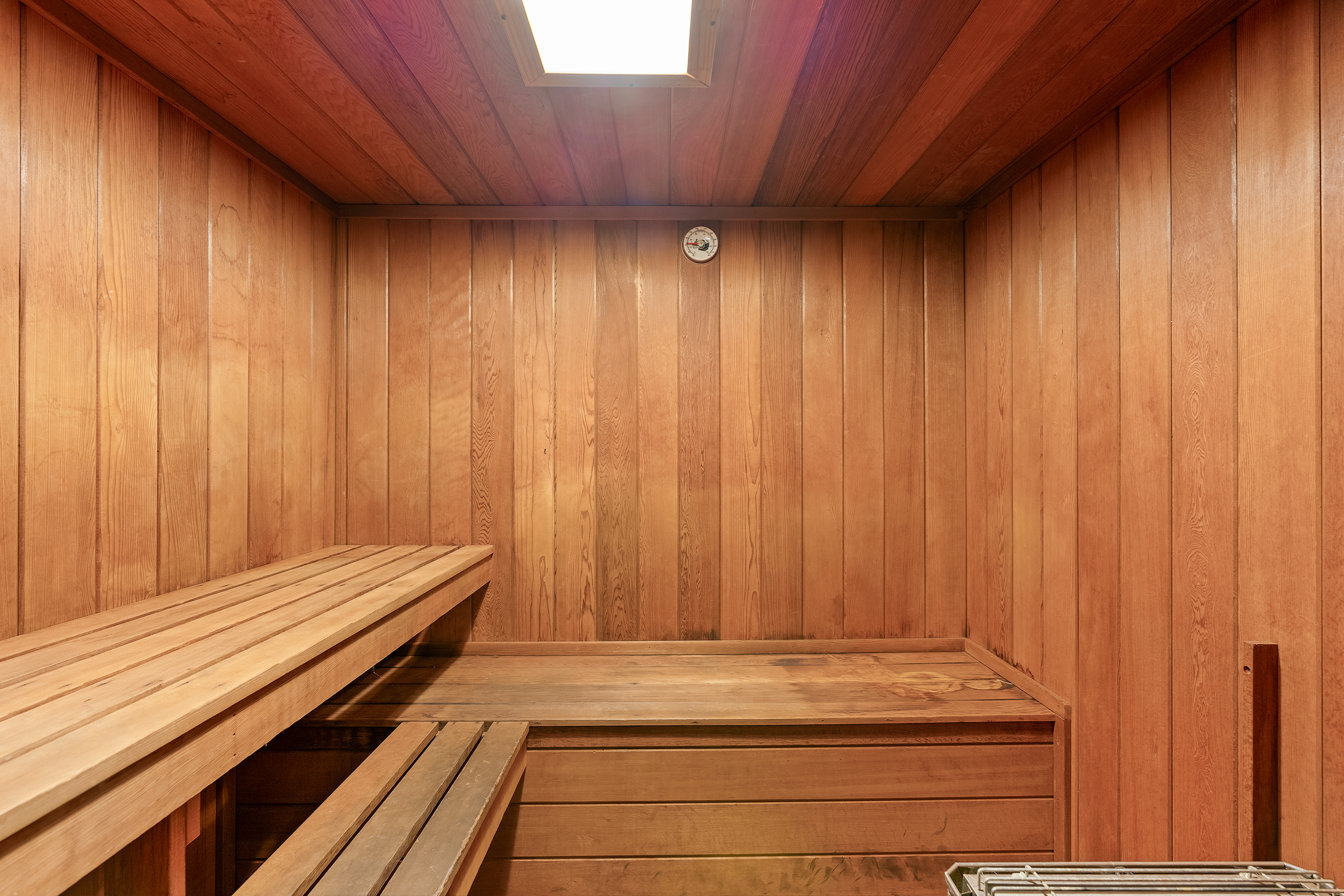 343 East 74th Street, Unit 7L Manhattan, NY 10021 - Photo 9 of 11 a view of a room with wooden walls