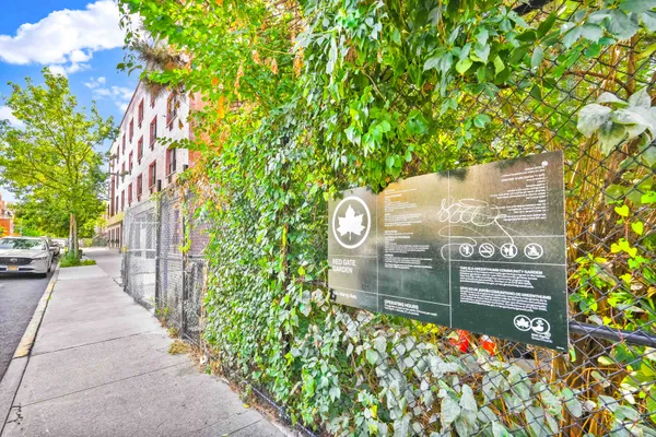 a view of a wooden door and sign board